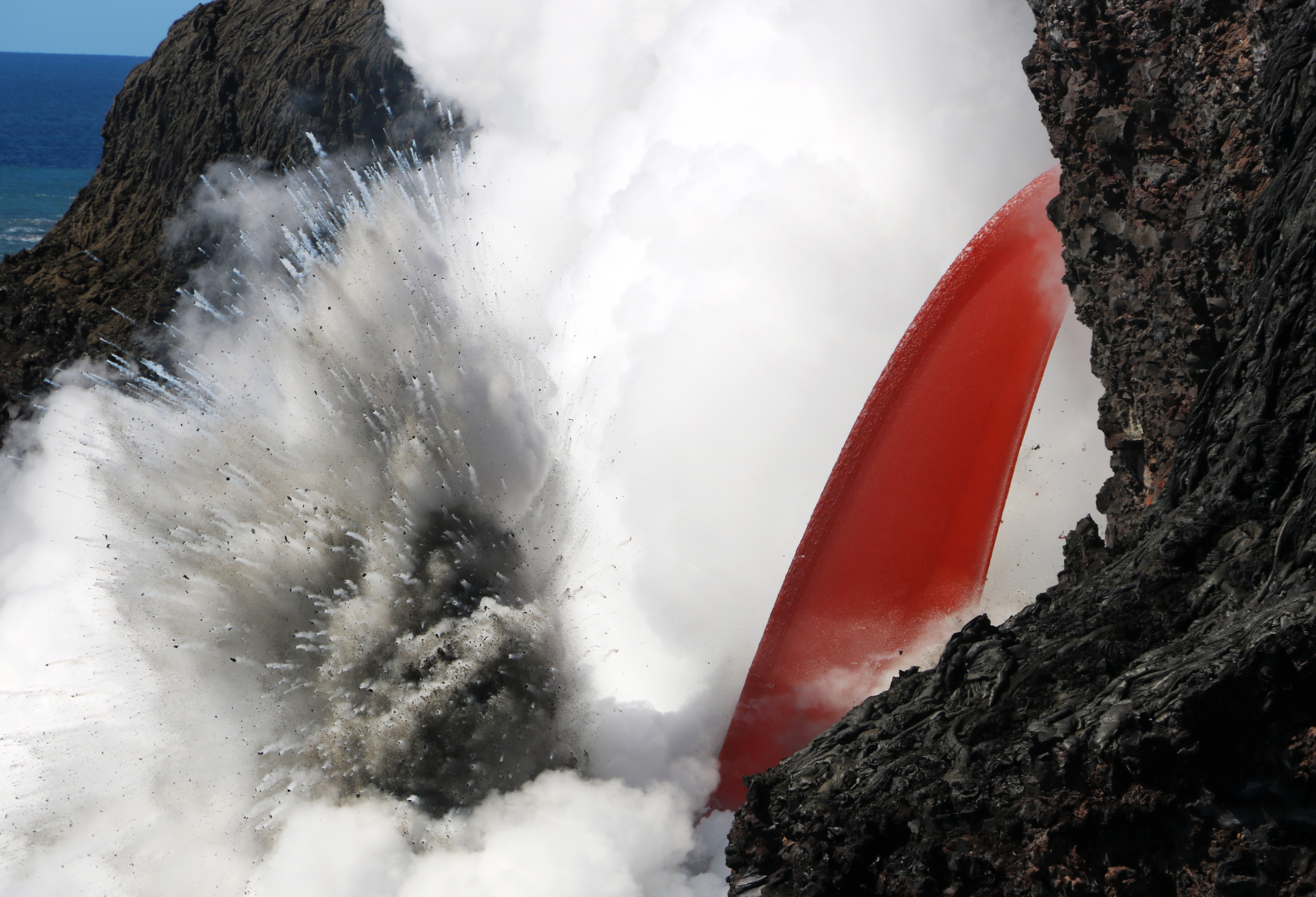 Watch: In Hawaii, 'firehose' of lava pours into the ocean