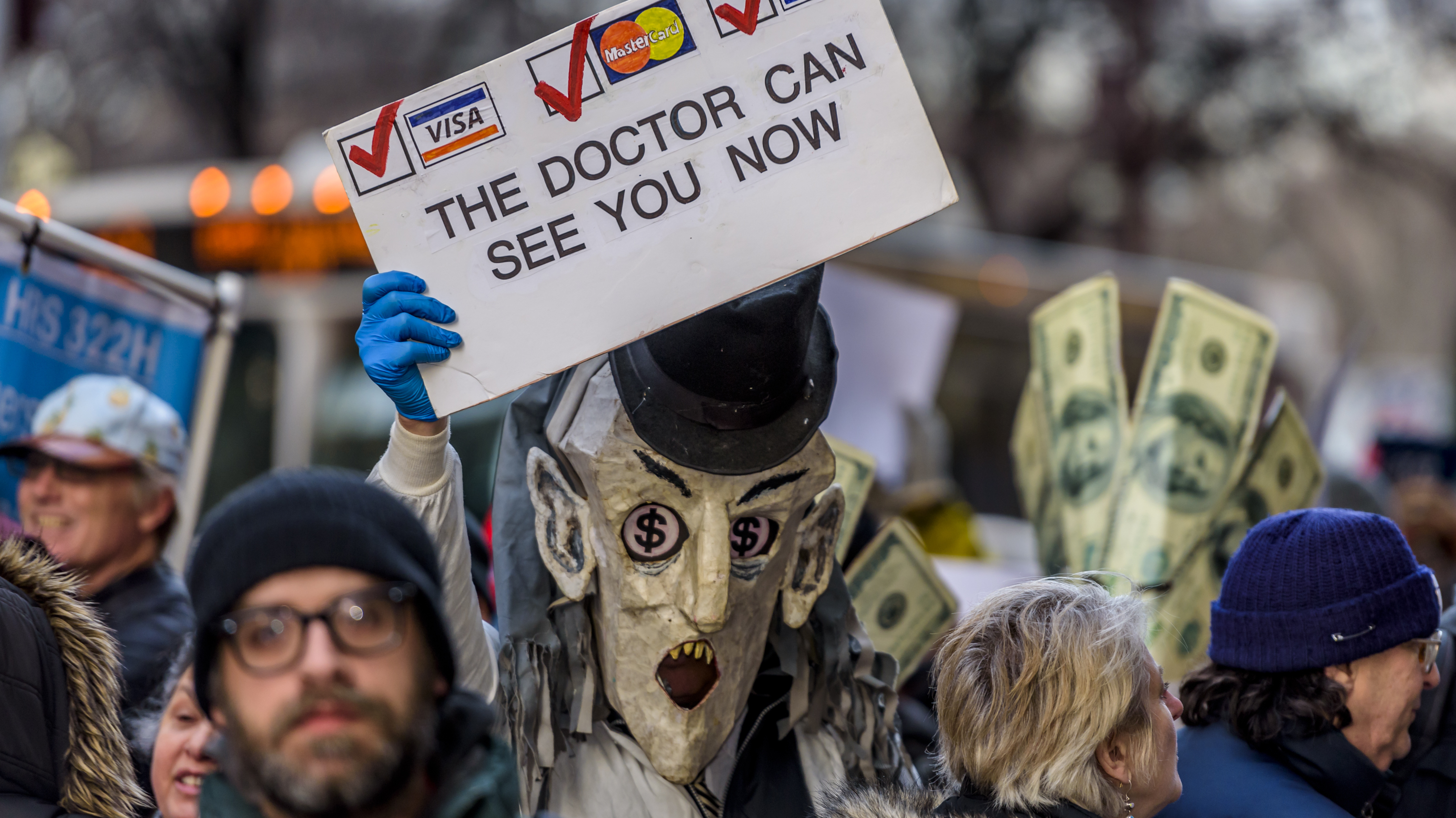 Outside Trump Tower in New York City, health care justice advocates and other grass-roots groups gathered to demand that Trump not agree to repeal the Affordable Care Act. (LightRocket via Getty Images)