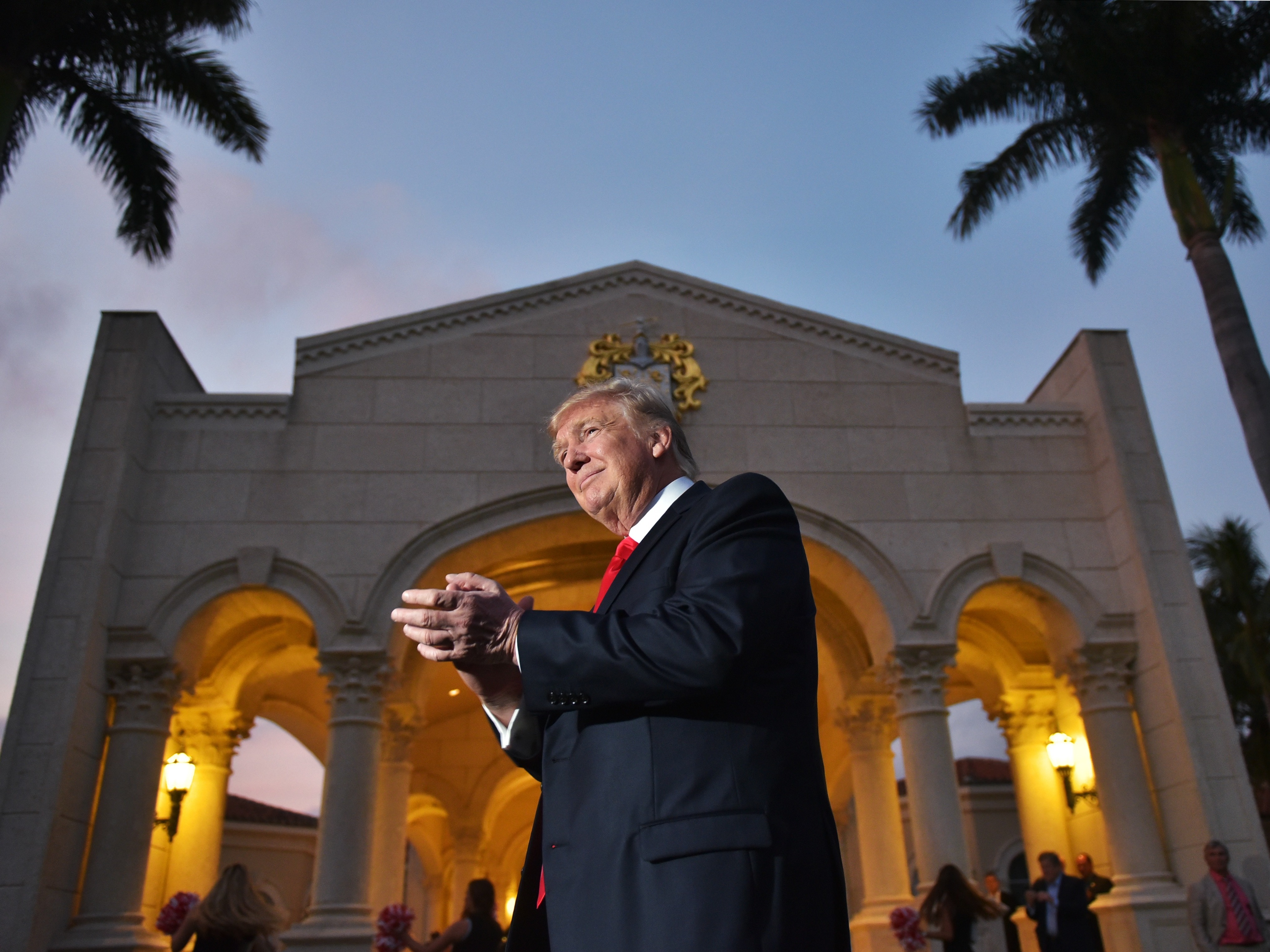 President Trump arrives to watch the Super Bowl at Trump International Golf Club in West Palm Beach, Fla., on Sunday. (AFP/Getty Images)