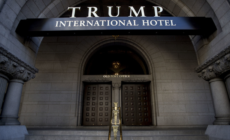 President Trump has removed his name from the lease of the Trump International Hotel in Washington, D.C., but the revocable trust he has set up for its profits has not settled ethics concerns. (Gabriella Demczuk/Getty Images)