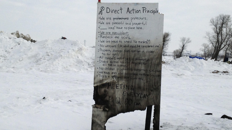 A sign is seen at an encampment set up near Cannon Ball, N.D., Wednesday, where opponents are protesting the construction of the Dakota Access pipeline. (James MacPherson/AP)