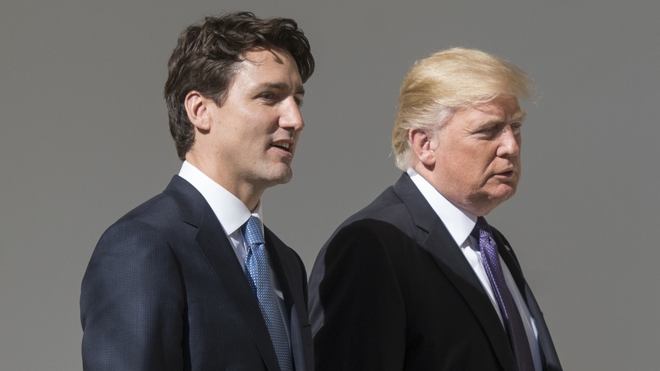President Trump and Canadian Prime Minister Justin Trudeau walk down the West Wing Colonnade between meetings at the White House Monday. (Saul Loeb/AFP/Getty Images)