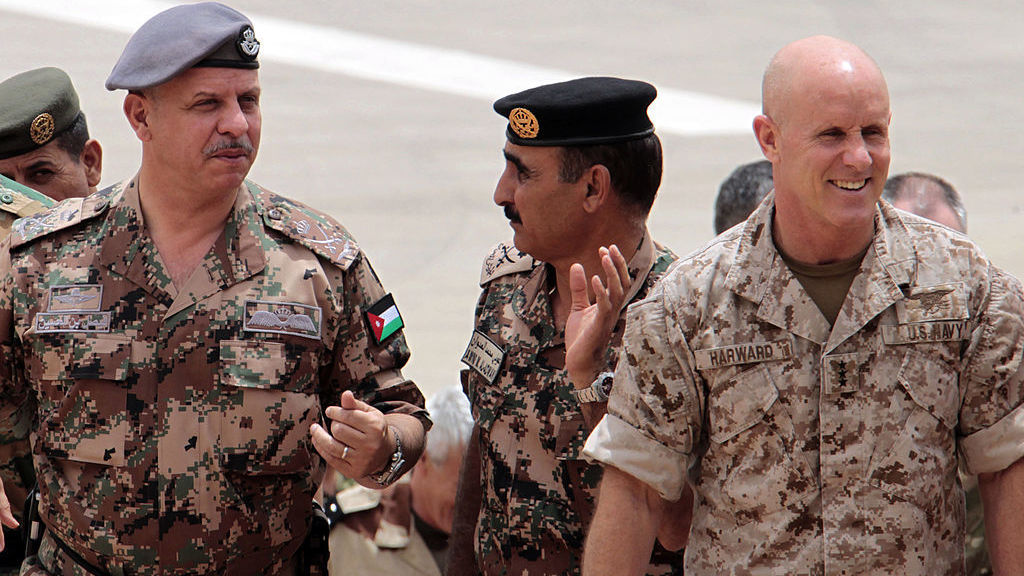 Then-deputy director of CENTCOM, U.S. Navy Vice Admiral Robert Harward, is pictured with  Jordan's Prince Faisal and the Army's head of operations and training Major General Awni Adwan in a May 2012 photo. Harward is now under consideration to replace Michael Flynn as President Trump's national security adviser. (AFP/Getty Images)