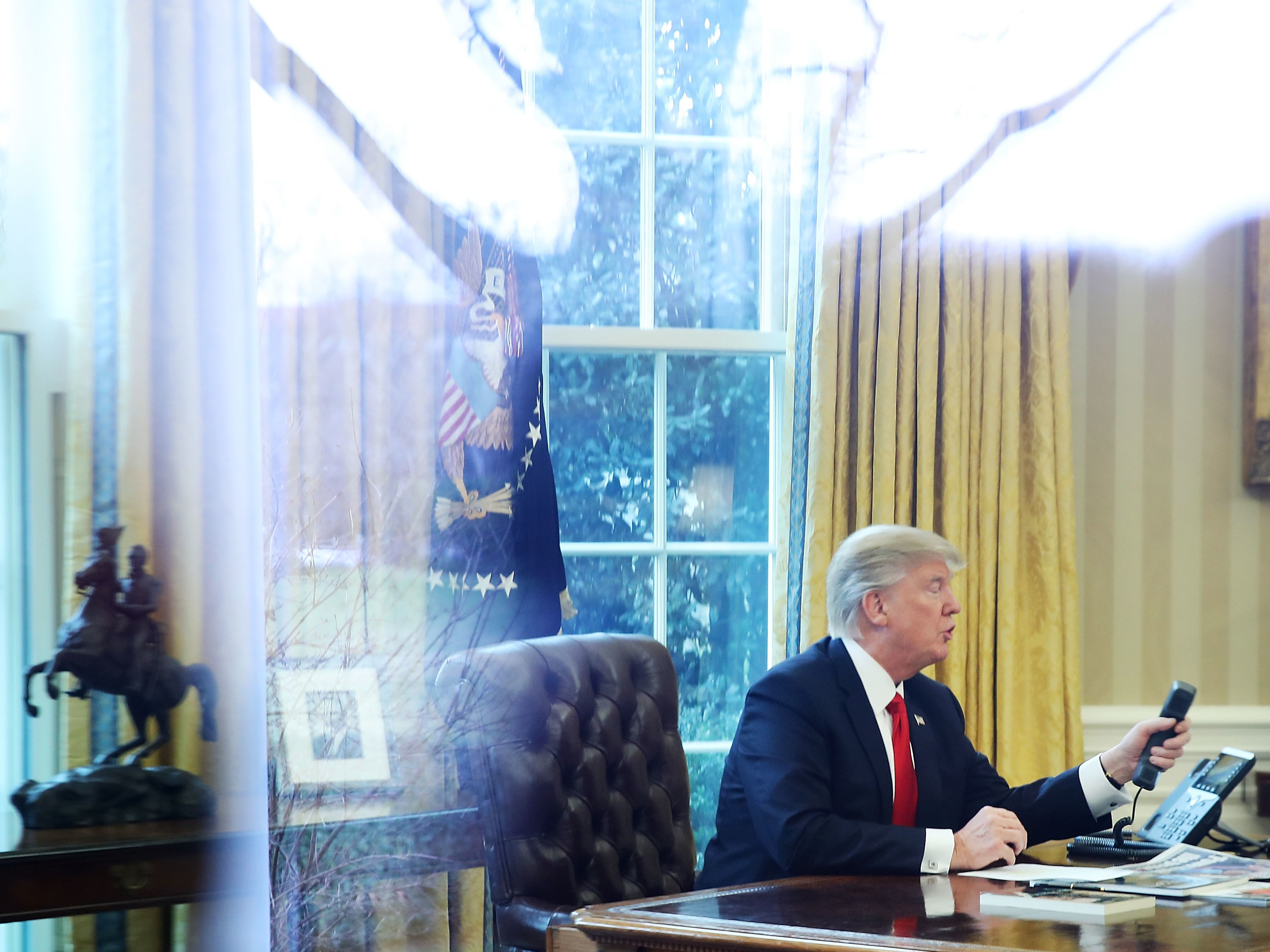President Trump calls the king of Saudi Arabia, Salman bin Abd al-Aziz Al Saud, in the Oval Office of the White House on Jan. 29. (Getty Images)