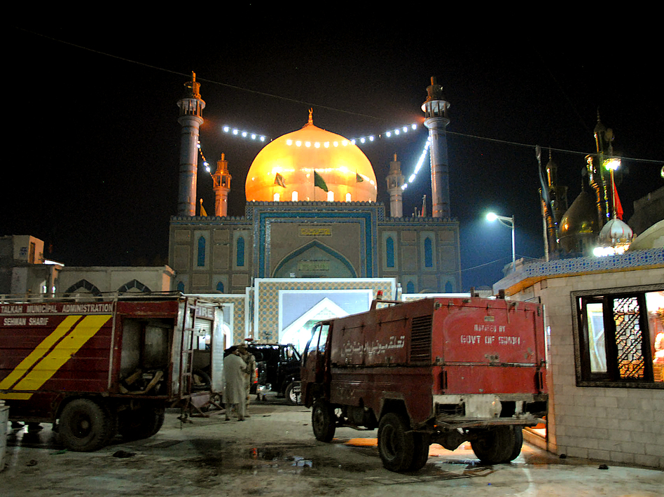 Pakistani soldiers cordon off the shrine of 13th-century Sufi saint Lal Shahbaz Qalandar, in the town of Sehwan, after a bomb killed dozens of worshippers Thursday. (Yousuf Nagori/AFP/Getty Images)