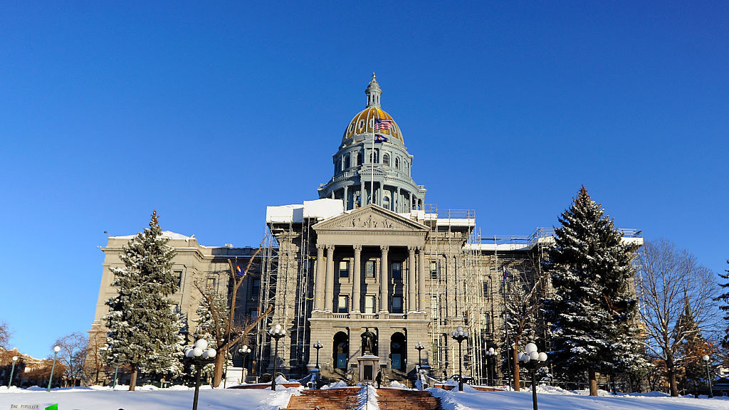 The state Capitol in Denver in December. The Grand Junction <em>Sentinel</em> has threatened to sue state Sen. Ray Scott after the lawmaker accused the paper of spreading &quot;fake news.&quot; (AFP/Getty Images)