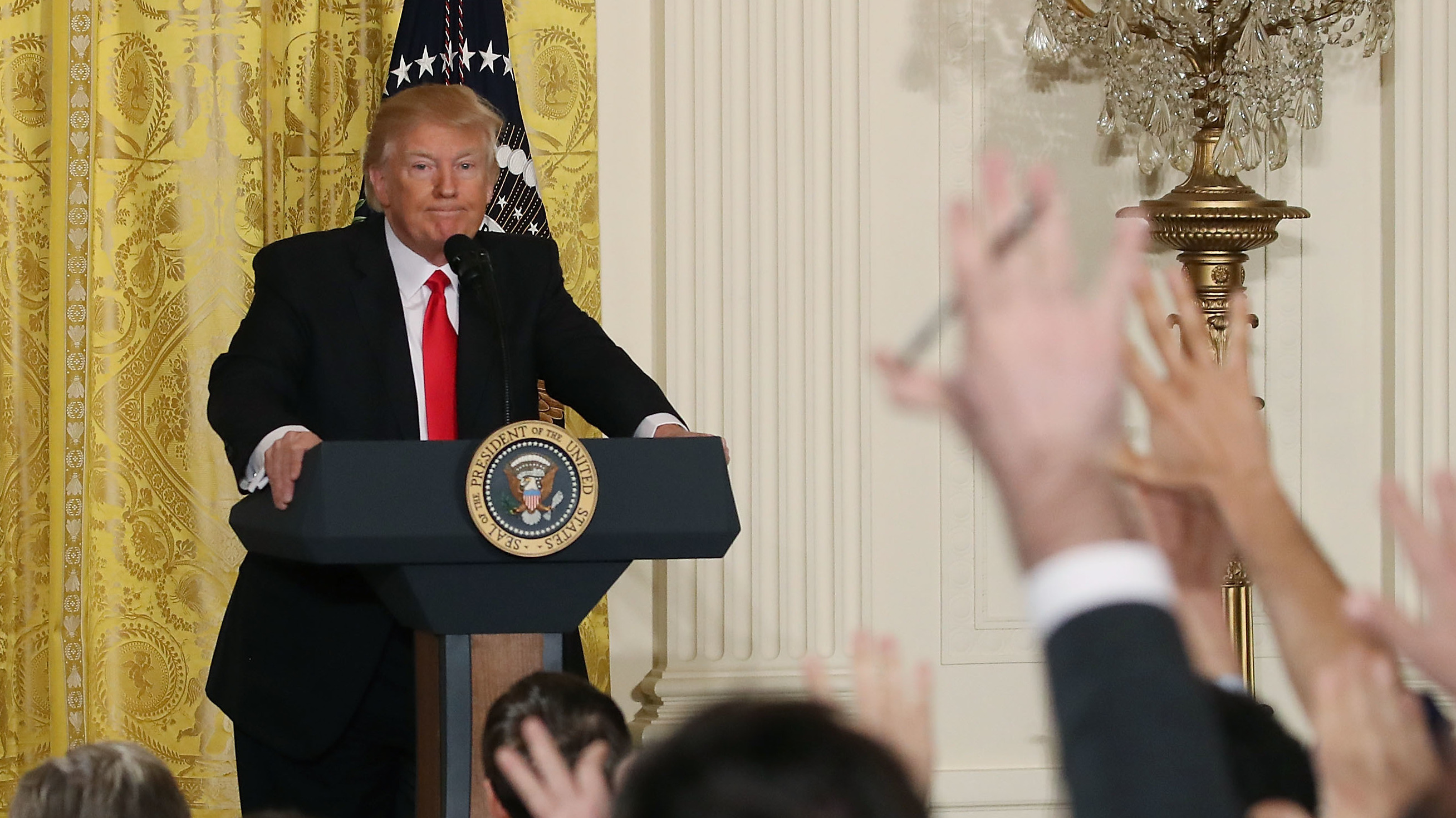 President Trump takes questions from reporters during a news conference Thursday. His supporters like it when he criticizes the media. (Getty Images)