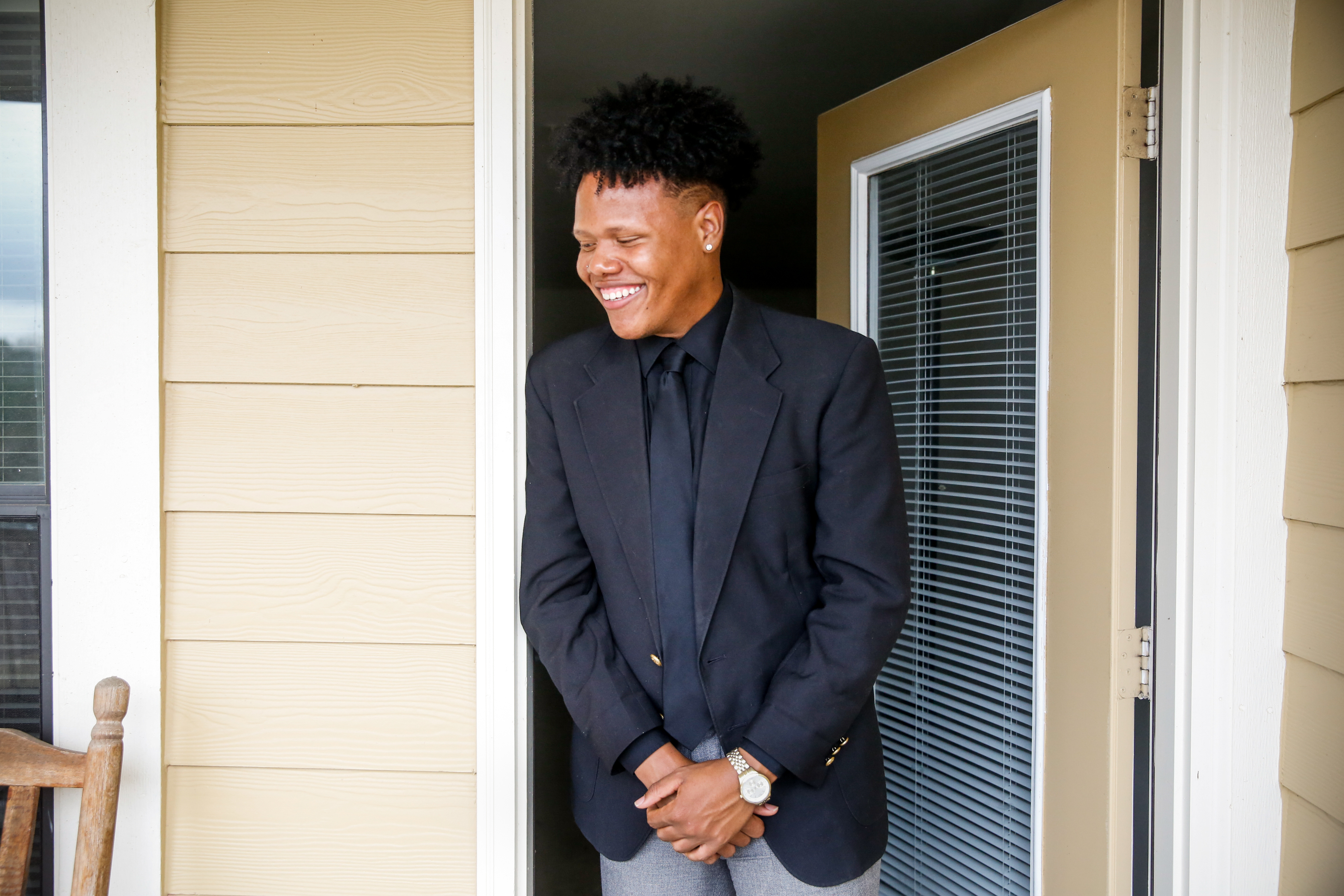 Terrence Johnson, a junior at the University of Mississippi, poses for a portrait outside his apartment in Oxford, Miss. (NPR)