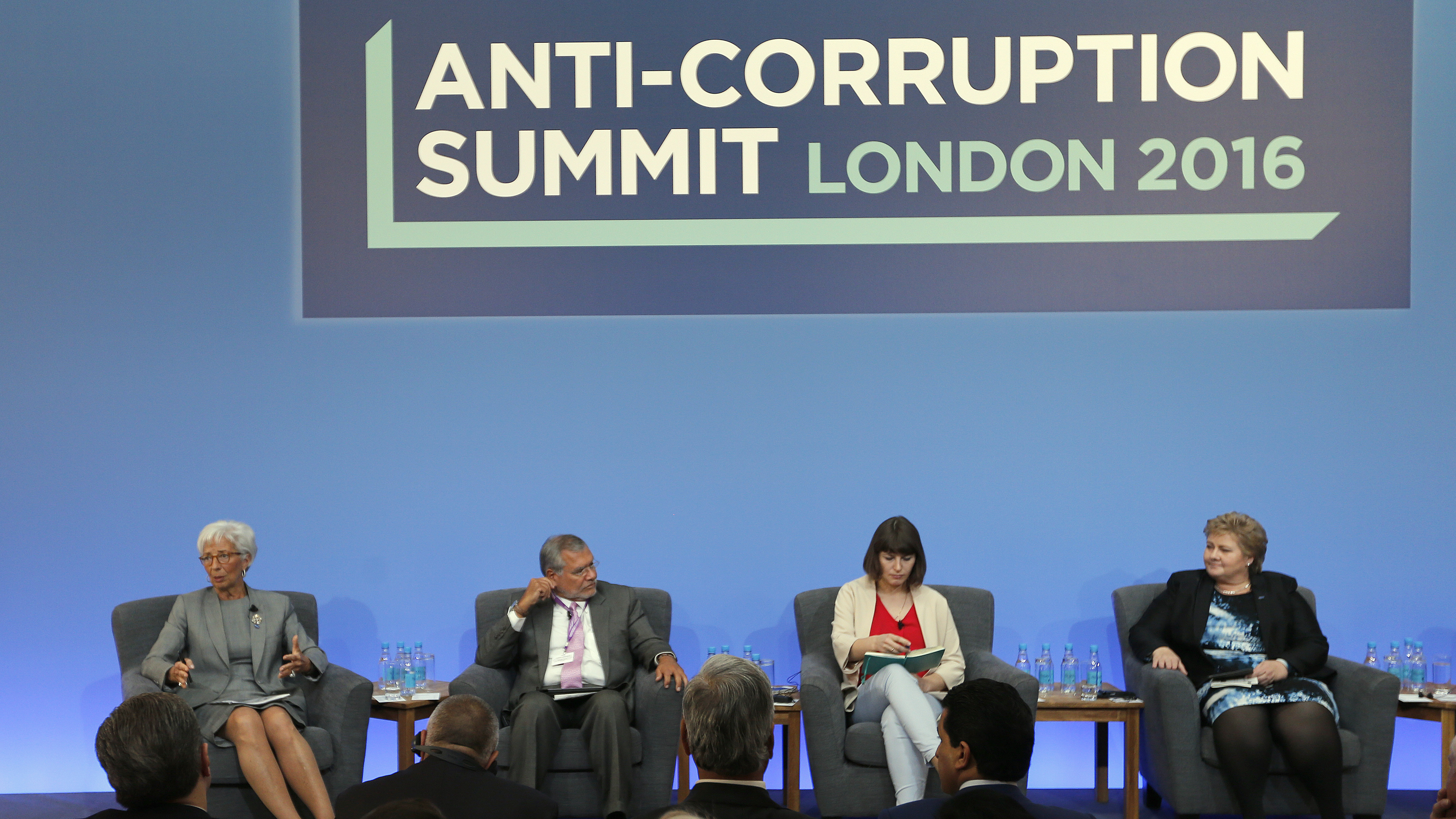 International Monetary Fund Managing Director Christine Lagarde (from left), Jose Ugaz of Transparency International, Daria Kaleniuk of the Anti-Corruption Action Center, and Norway