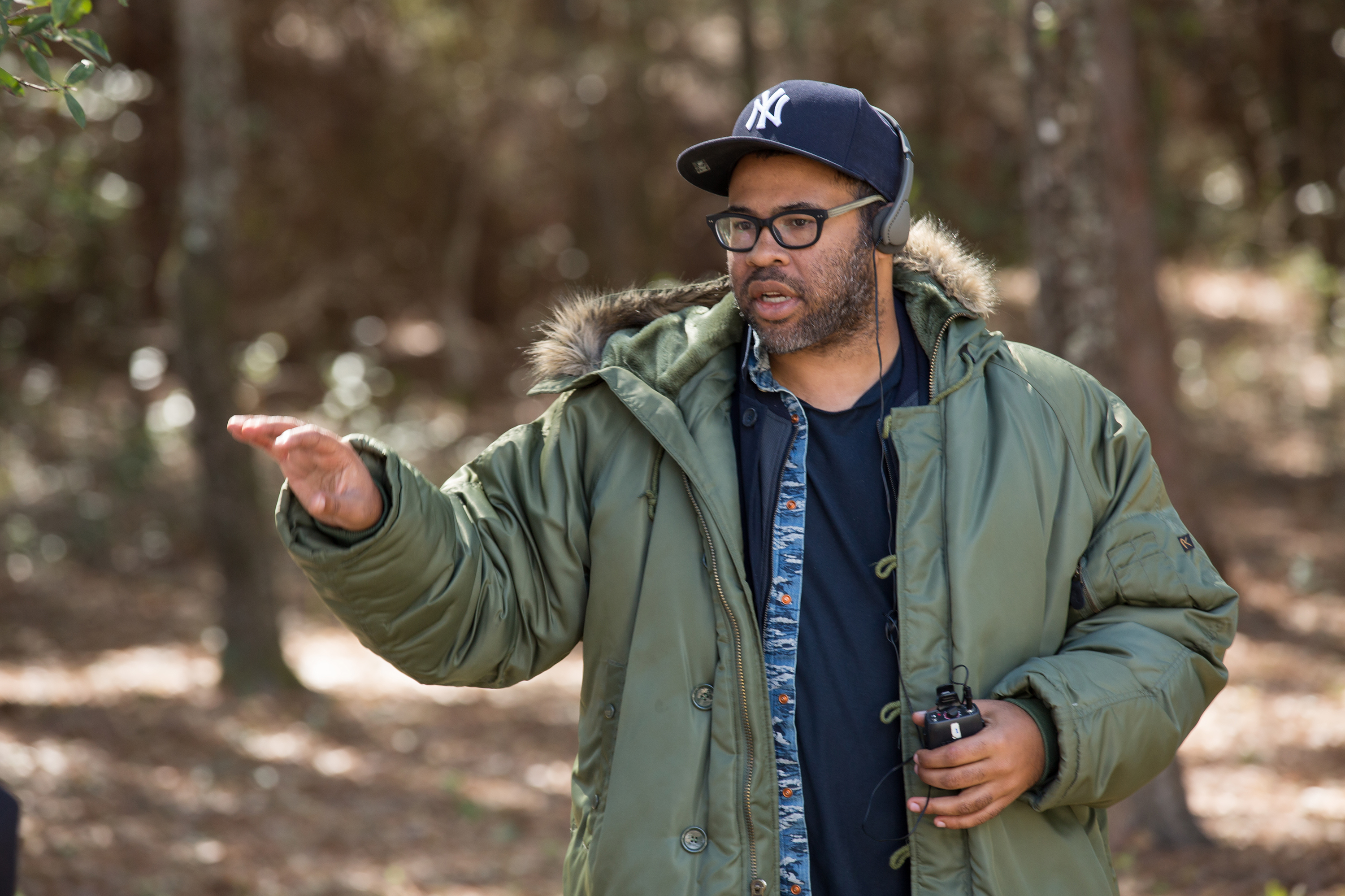 Writer, director, producer Jordan Peele directs a scene on the set of his new horror movie, <em>Get Out</em>. (Universal Pictures)