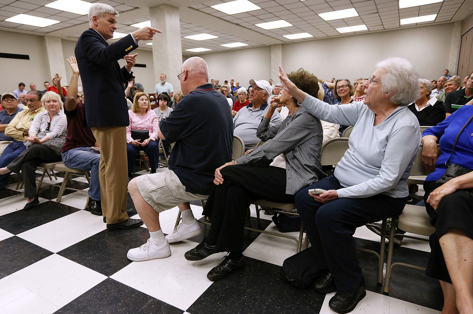 Sen. Bill Cassidy, R-La., responds to constituents concerned about their coverage under the Affordable Care Act. (Jonathan Bachman/Getty Images)