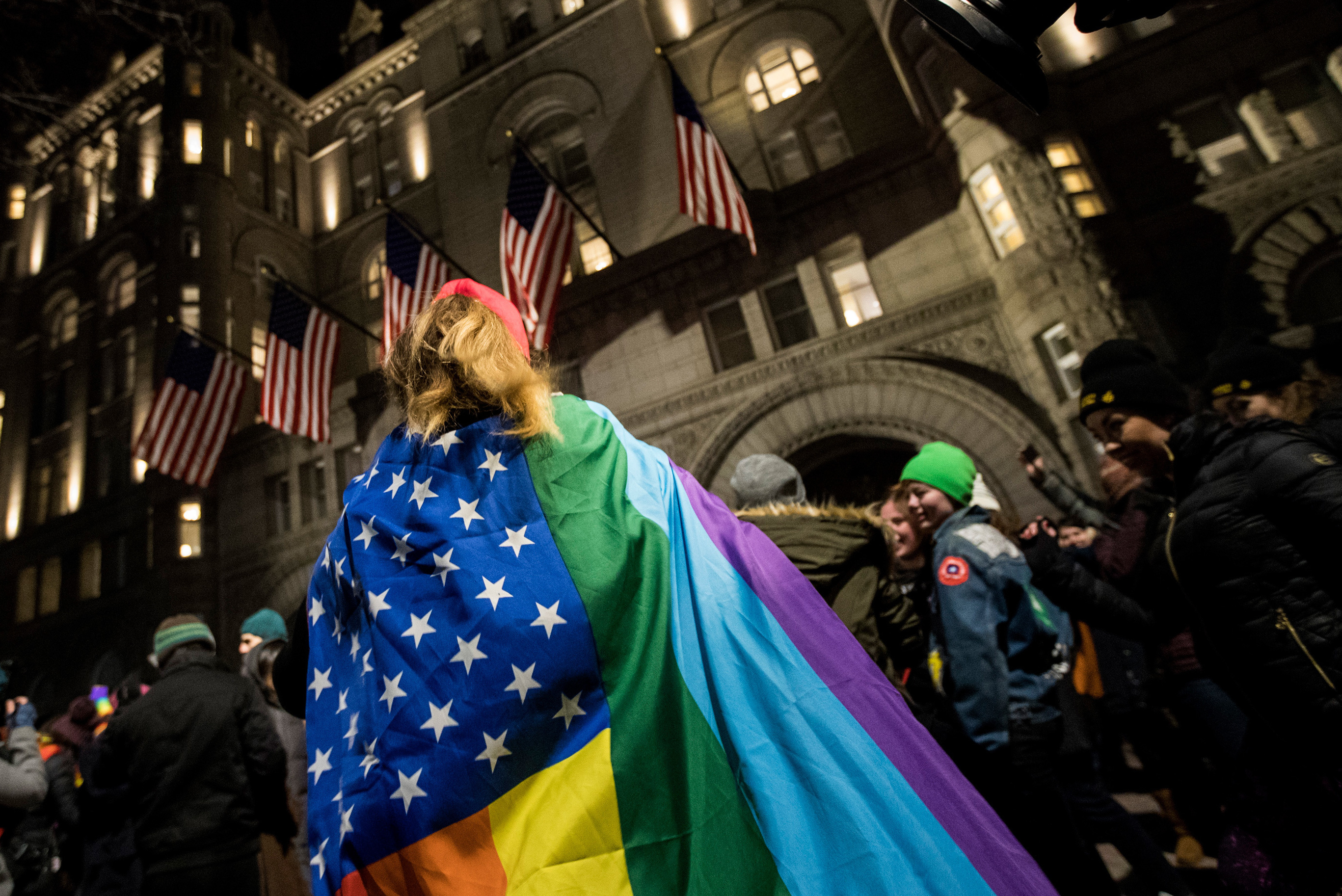 Protesters and LGBT activists rally outside Trump International Hotel this month in Washington, D.C. (Getty Images)