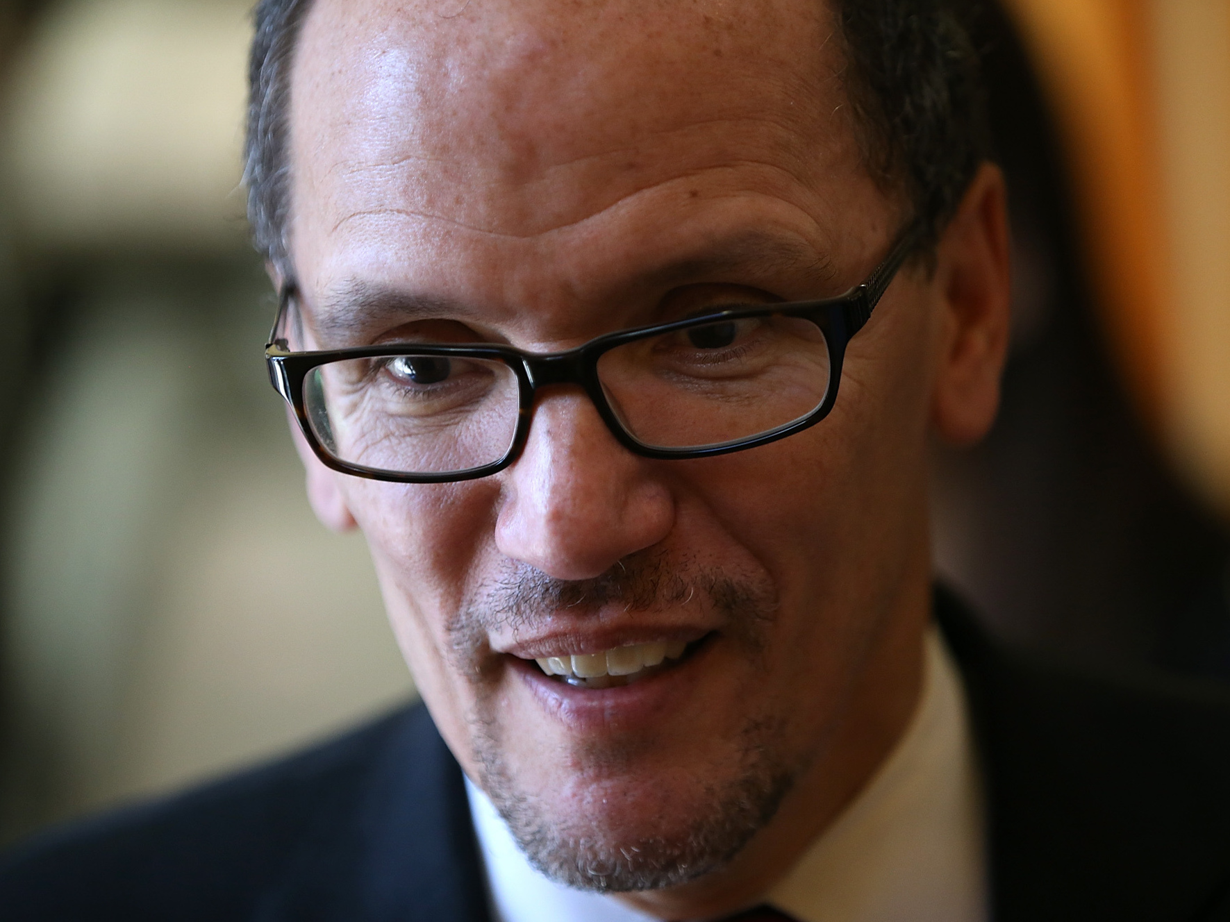 U.S. Labor Secretary Thomas Perez looks on while visiting La Cocina on January 22, 2014 in San Francisco. (Getty Images)