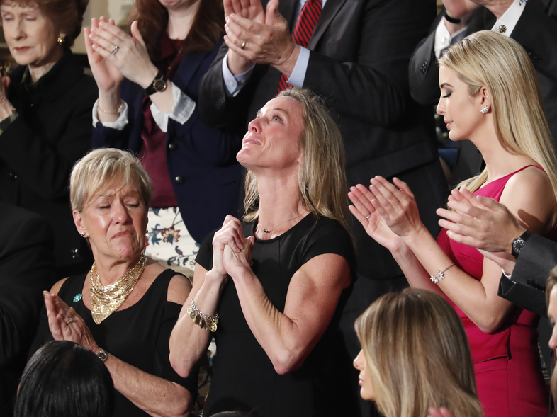 Carryn Owens, the widow of Navy SEAL William "Ryan" Owens, fought back tears as President Trump addressed her during his speech to a joint session of Congress Tuesday. (Pablo Martinez Monsivais/AP)