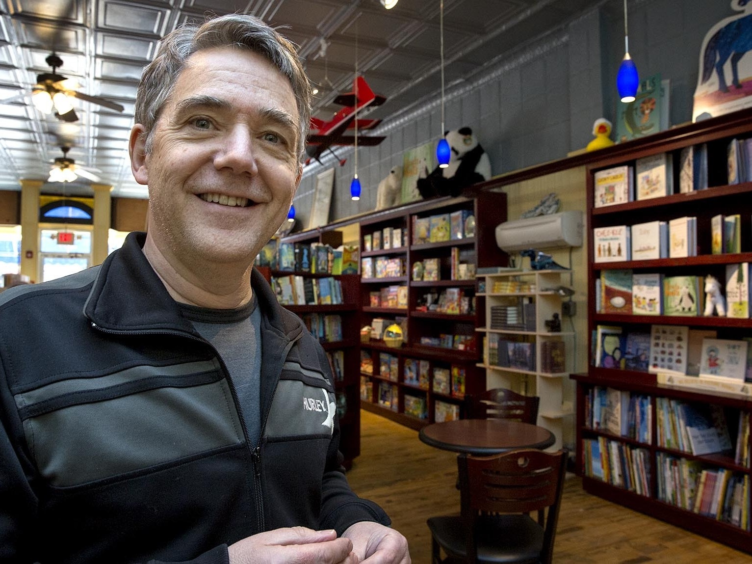 Peter Reynolds, owner of Blue Bunny Books in Dedham, Mass., says he hopes the unique atmosphere will keep customers coming to independent bookstores like his. (WBUR)