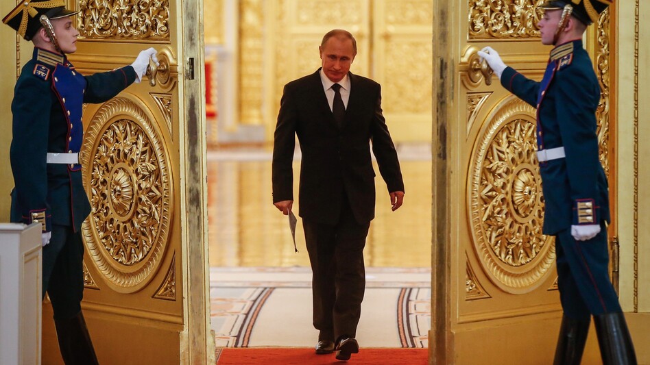 Russian President Vladimir Putin enters a hall in the Kremlin before a meeting in 2015. (Sergei Ilnitsky/AFP/Getty Images)