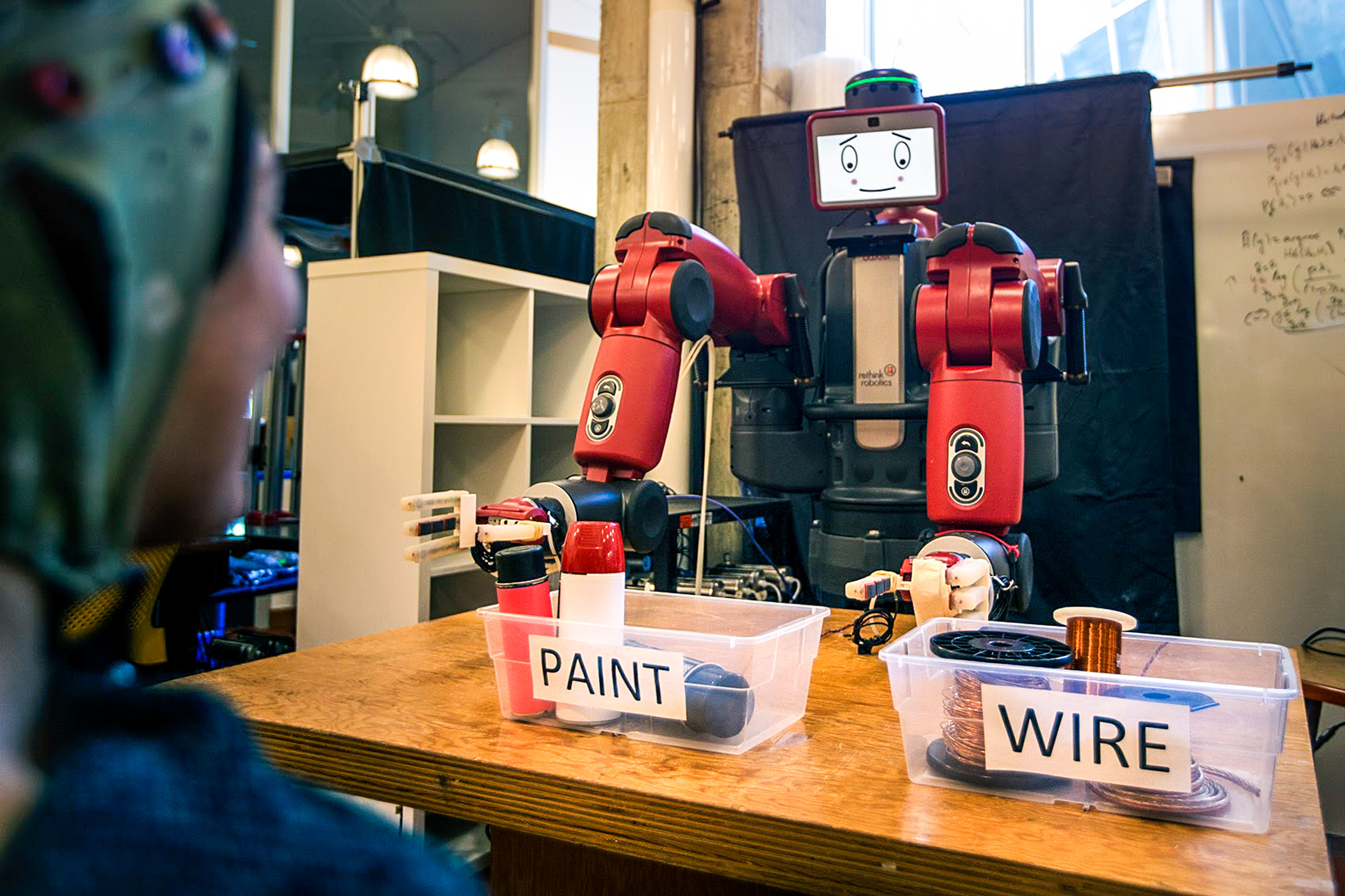 In the experiment, Baxter, a robot from Rethink Robotics, looks embarrassed when he makes the wrong choice. (WBUR)
