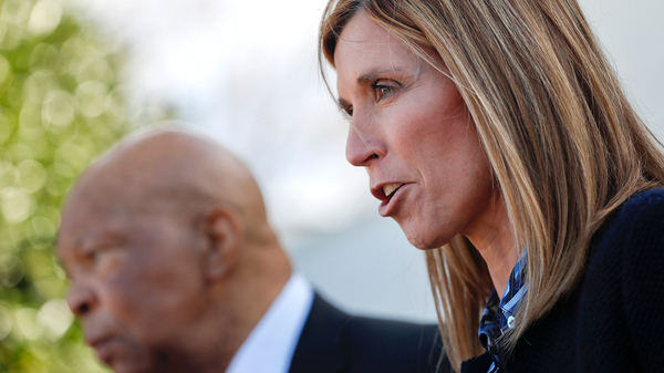 Redonda Miller (right), president of Johns Hopkins Hospital, and Rep. Elijah Cummings, D-Md., speak to journalists after their White House meeting Wednesday with President Donald Trump on the high cost of prescription drugs.