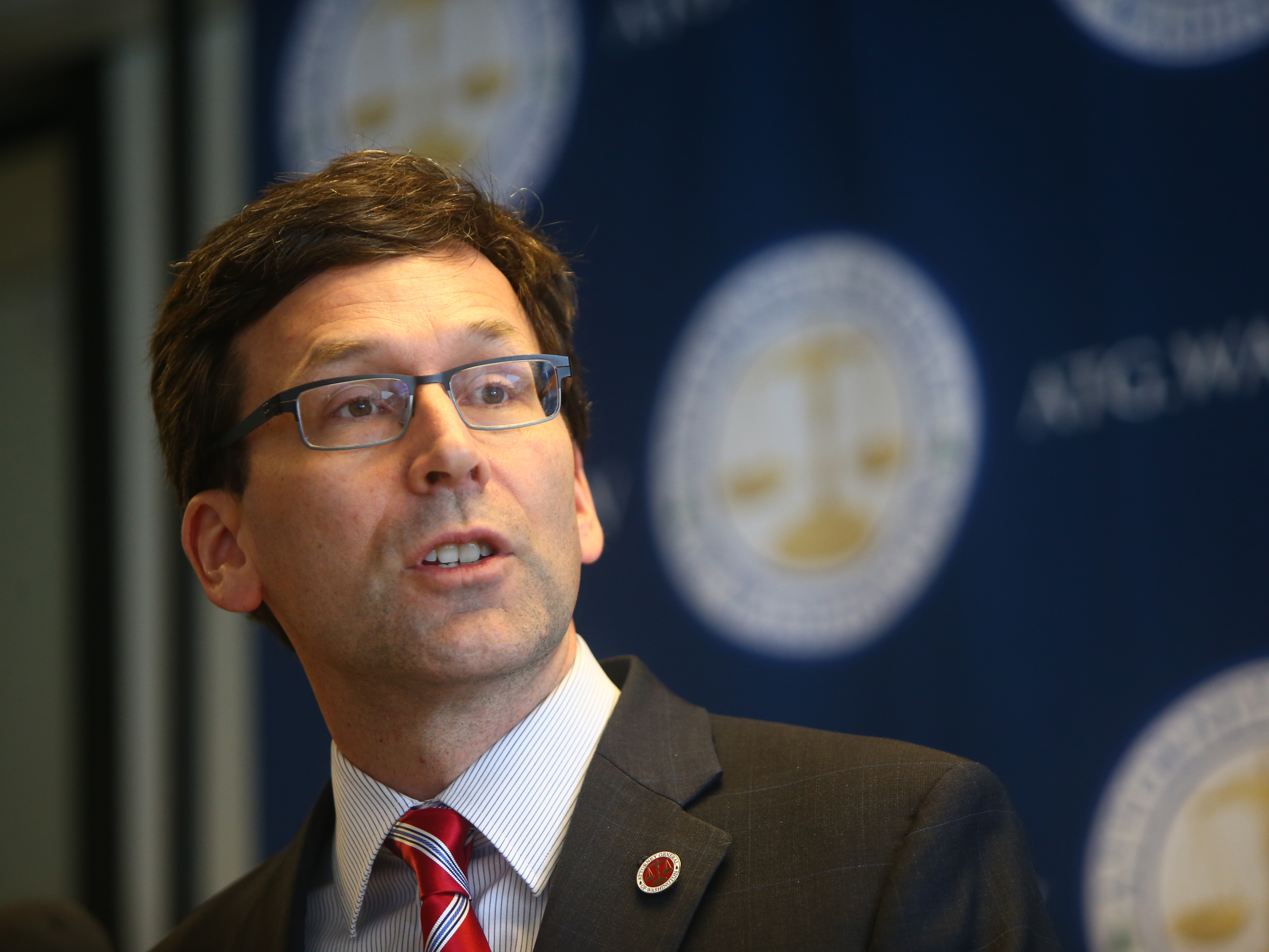 Washington state Attorney General Bob Ferguson holds a news conference Monday in Seattle to discuss President Trump's new immigration executive order. (Getty Images)