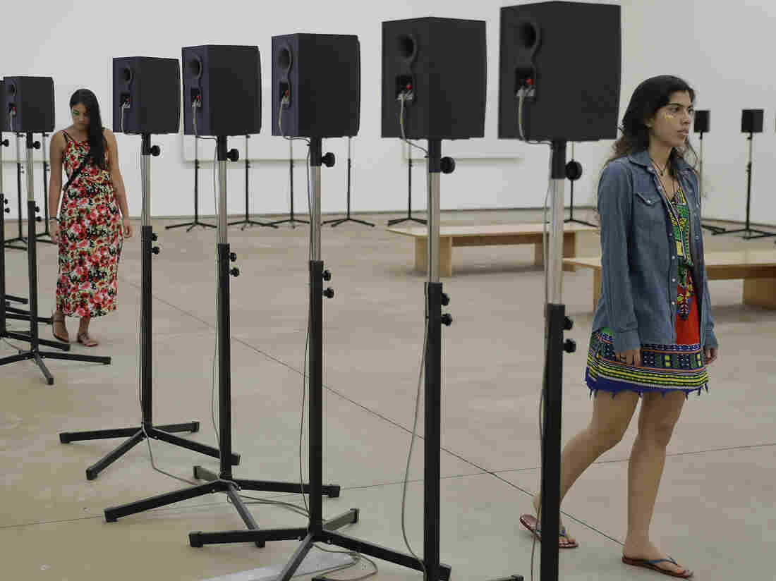 People visit Janet Cardiff's art installation last November at the Inhotim Institute, in Brumadinho, Brazil.