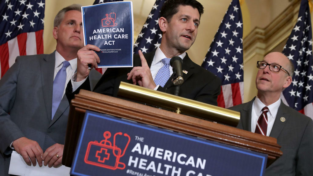 House Speaker Paul Ryan holds a copy of the American Health Care Act, the House Republican leadership's plan to repeal and replace the Affordable Care Act, which is already facing opposition from conservatives in the House and Senate. (Getty Images)