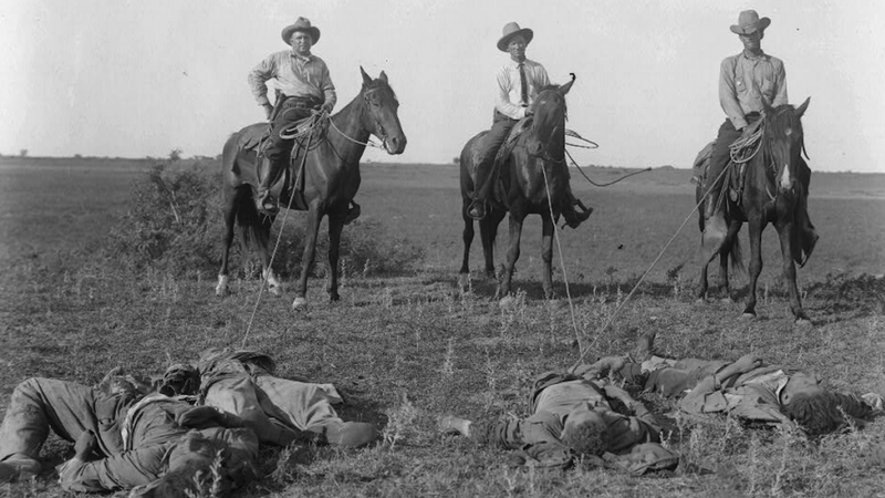 Texas Rangers mounted on horses in 1915.