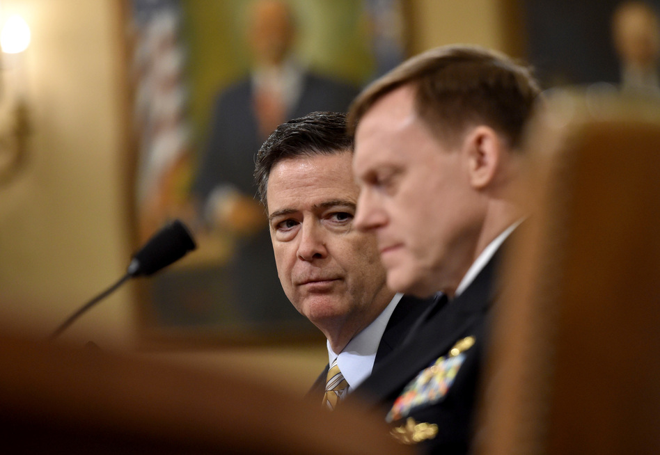 FBI Director James Comey and National Security Agency Director Mike Rogers testify during the House Permanent Select Committee on Intelligence hearing on Russian actions during the 2016 election campaign. (Nicholas Kamm/AFP/Getty Images)