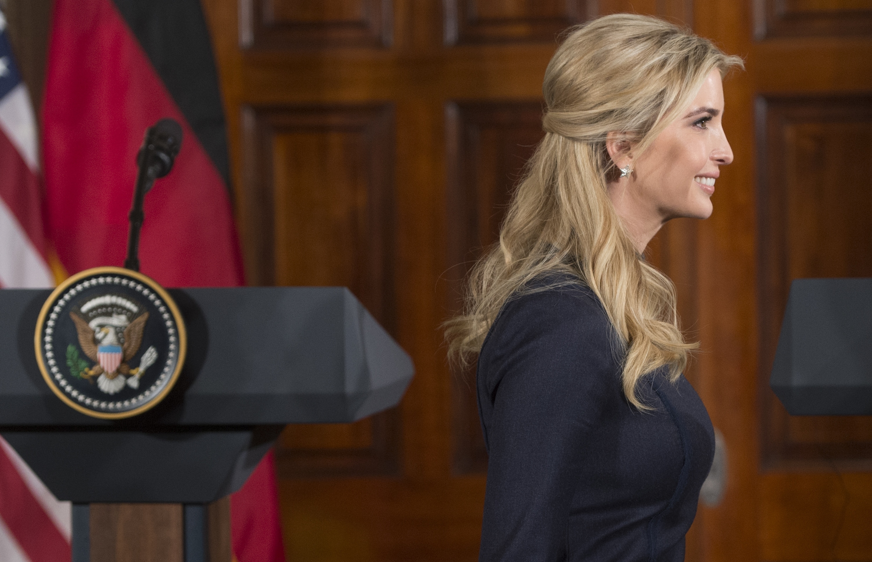 Ivanka Trump arrives for a joint news conference between President Trump and German Chancellor Angela Merkel in the East Room of the White House earlier this month. Ethics experts say that Ivanka Trump's dual role as a business owner and West Wing staffer raises questions about conflicts of interest. Ivanka says she will comply voluntarily with ethics rules. (AFP/Getty Images)