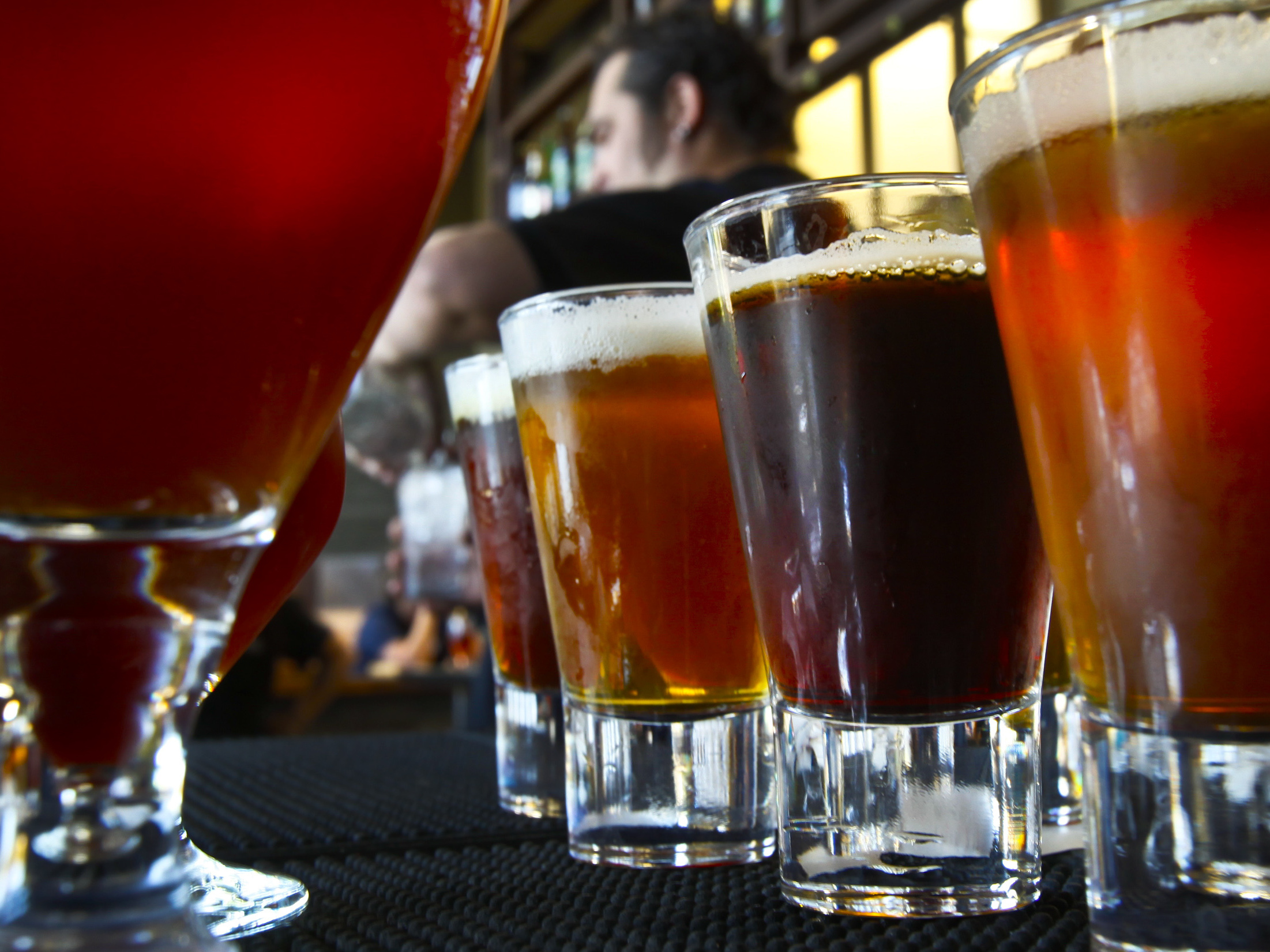 Stone Brewing's Full Circle Pale Ale — not seen in this photo — was made with water from an advanced filtration system that recycles and purifies San Diego's wastewater. This image was taken at the Stone Brewing World Bistro and Gardens. (LA Times via Getty Images)