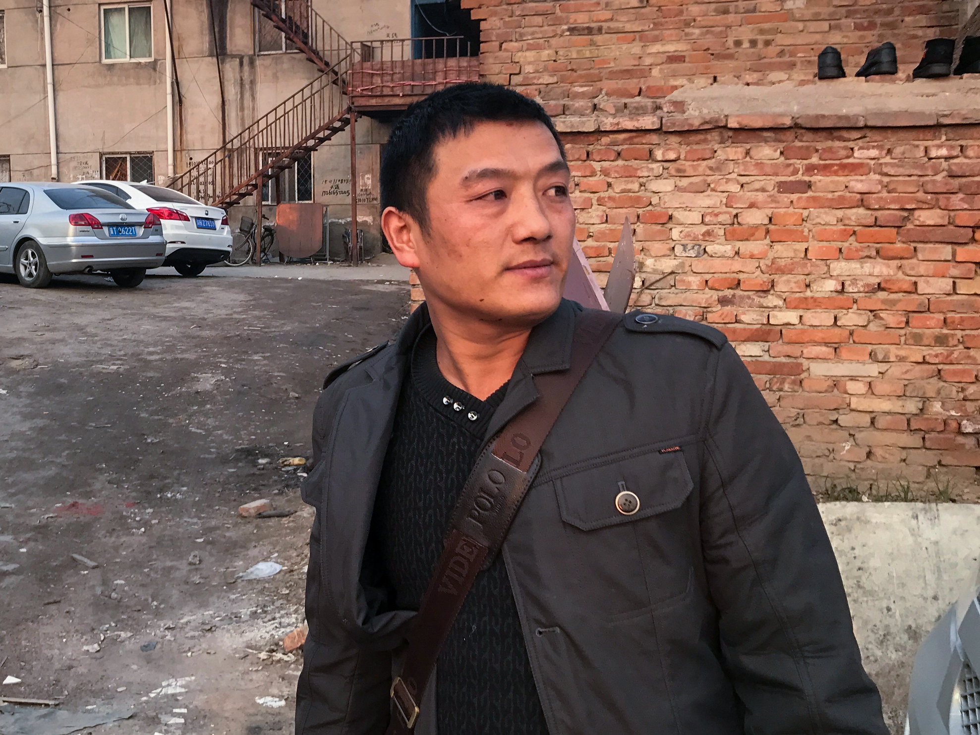 Wang Fei, 35, from southwest China's Chongqing region, drove cars for Didi Chuxing, China's main ride-hailing service, from last July until January, when new local rules banned out-of-town cars and drivers, and Didi cut bonuses to drivers. (NPR)