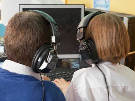Young school boys on computer