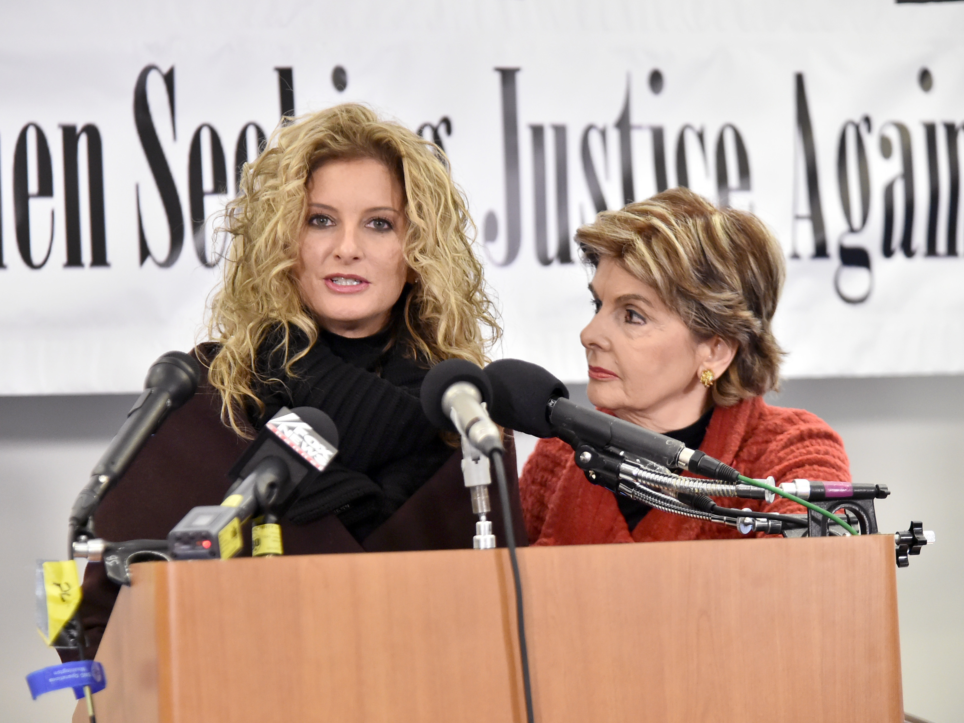 Summer Zervos, shown with attorney Gloria Allred earlier this year in Washington, D.C., accuses President Trump of sexual harassment and has filed a lawsuit against him. (Getty Images)
