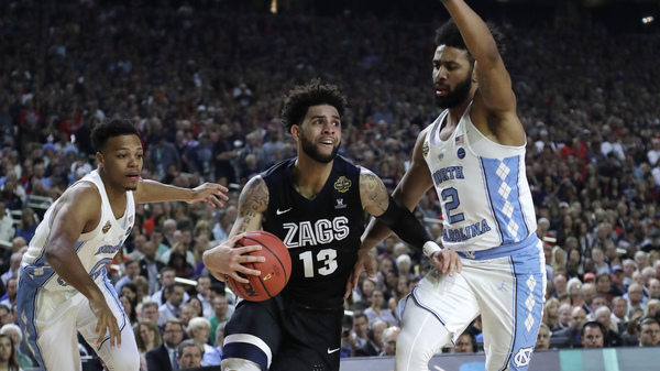 Gonzaga guard Josh Perkins drives past North Carolina guard Joel Berry II, right, Monday during the first half in the NCAA college basketball tournament finals in Glendale, Ariz.