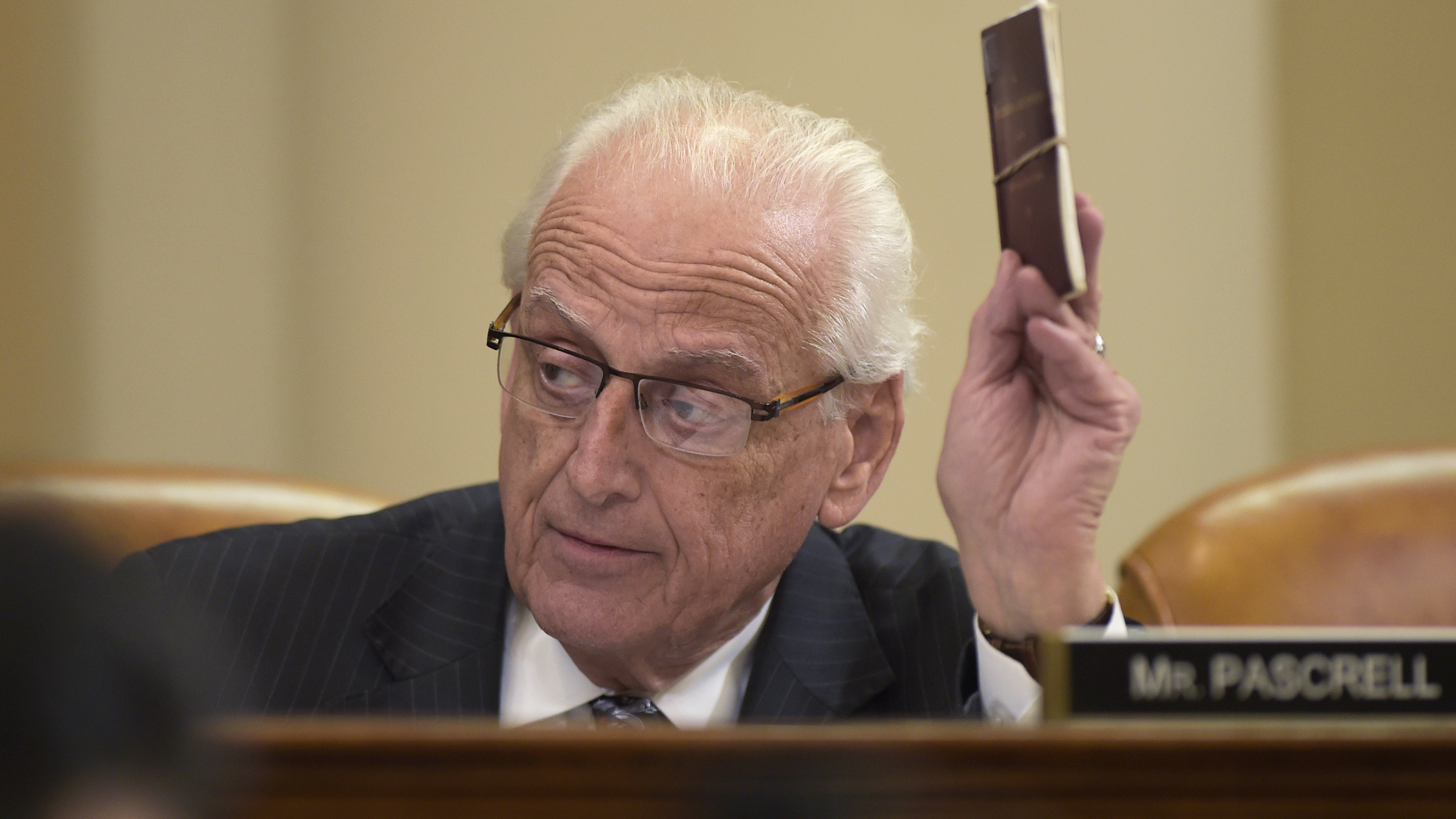 House Ways and Means Committee member Rep. Bill Pascrell Jr., D-N.J., holds up a copy of the Constitution as he speaks at a March committee meeting. Pascrell introduced House Resolution 186, an inquiry directing the Treasury secretary to provide to the House of Representatives President Trump's tax returns and other financial information.