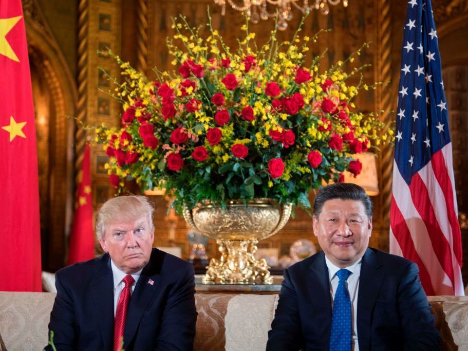President Trump sits with Chinese President Xi Jinping during a Thursday meeting at the Mar-a-Lago resort in Florida. The pair's first in-person talks wrap up Friday. (Getty Images)