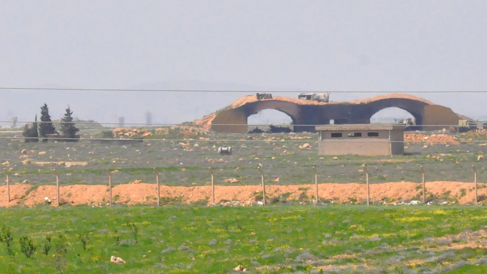 A picture taken Friday shows the damaged Shayrat airfield at the Syrian military base targeted overnight by U.S. Tomahawk cruise missiles, southeast of the central Syrian city of Homs. (AFP/Getty Images)