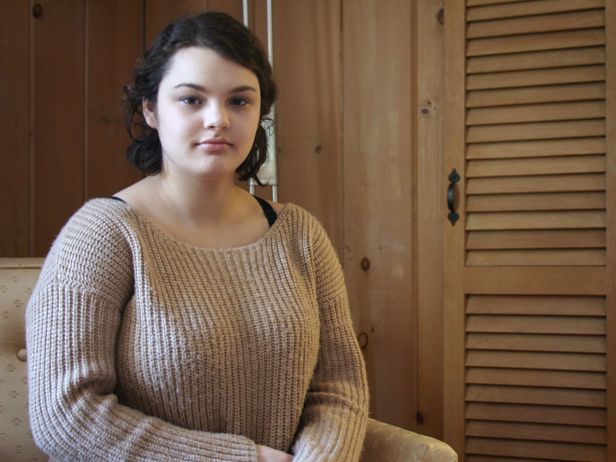 Hannah Berkowitz in her parents' home in West Hartford, Conn. Getting intensive in-home drug treatment is what ultimately helped her get back on track, she and her mom agree. (Jack Rodolico/NHPR)
