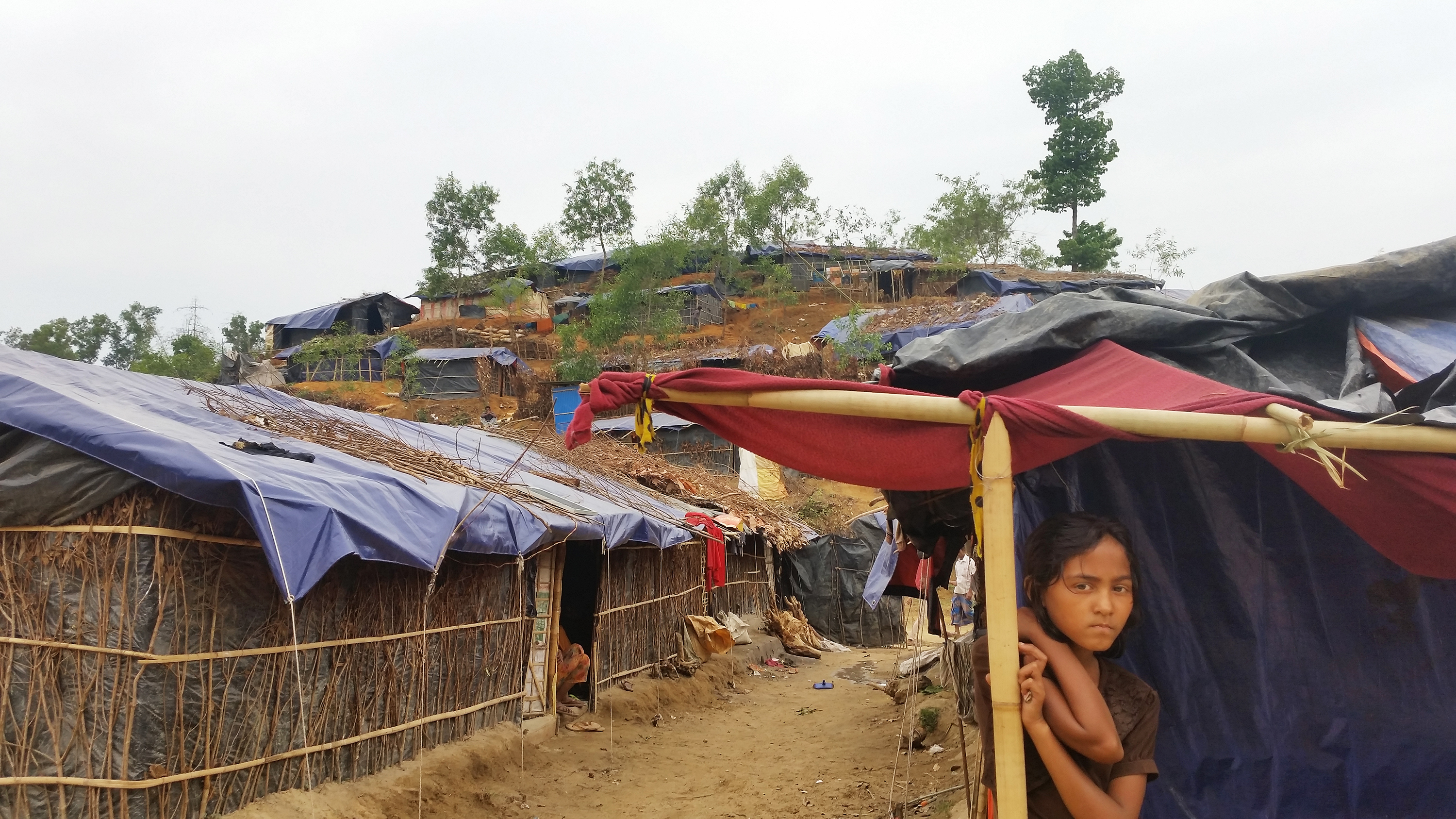 The Balukali refugee camp, located about an hour's drive south of the seaside tourist city of Cox's Bazar, is one of many informal camps in southern Bangladesh. An estimated 2,000 Rohingya families who fled neighboring Myanmar live in Balukali. (Michael Sullivan for NPR)