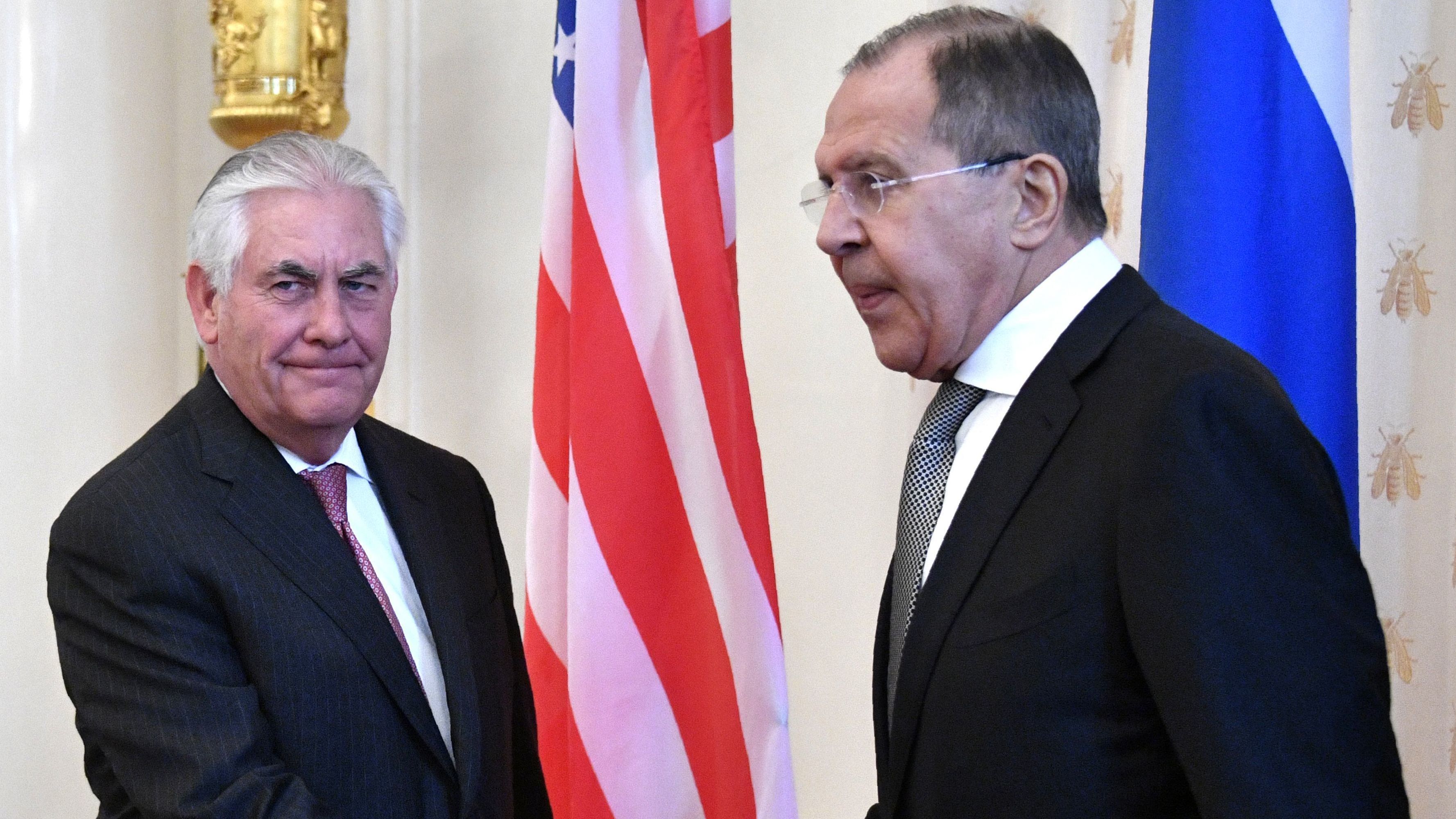 Secretary of State Rex Tillerson shakes hands with Russian Foreign Minister Sergey Lavrov at the start of their meeting in Moscow. Russia has accused the U.S. of breaking international law with its missile strike on Syria last week. (AFP/Getty Images)