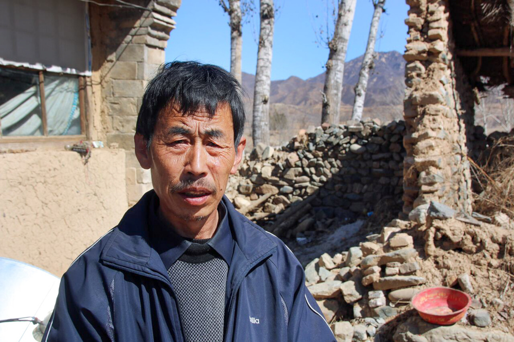 Farmer Ming Jun says he is doubtful that a government plan to integrate Beijing with surrounding cities can lift him and his village out of poverty. (NPR)