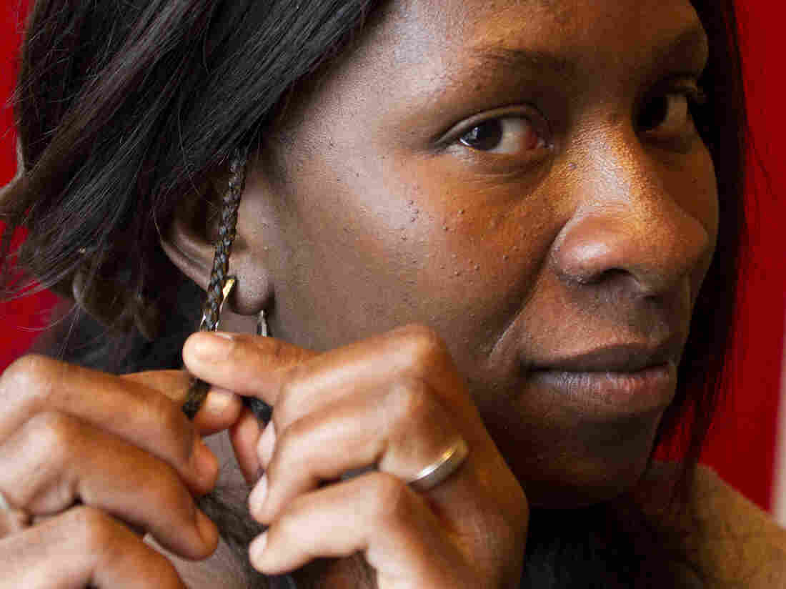 Jestina Clayton, former hair braider.