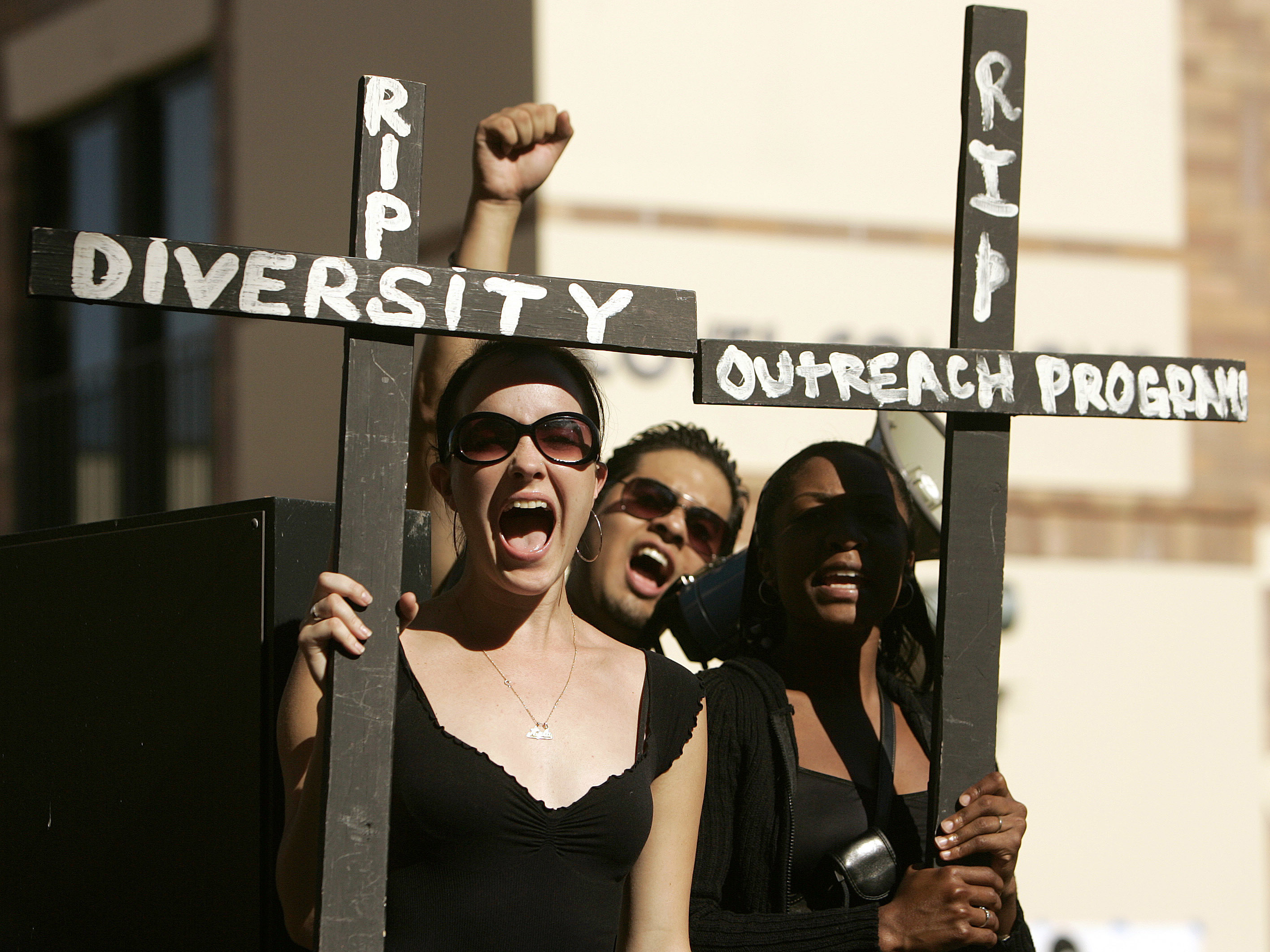 UCLA students hold crosses, while taking part in a 2006 rally on campus to express their concerns about the lack of racial diversity in the student body. (LA Times via Getty Images)