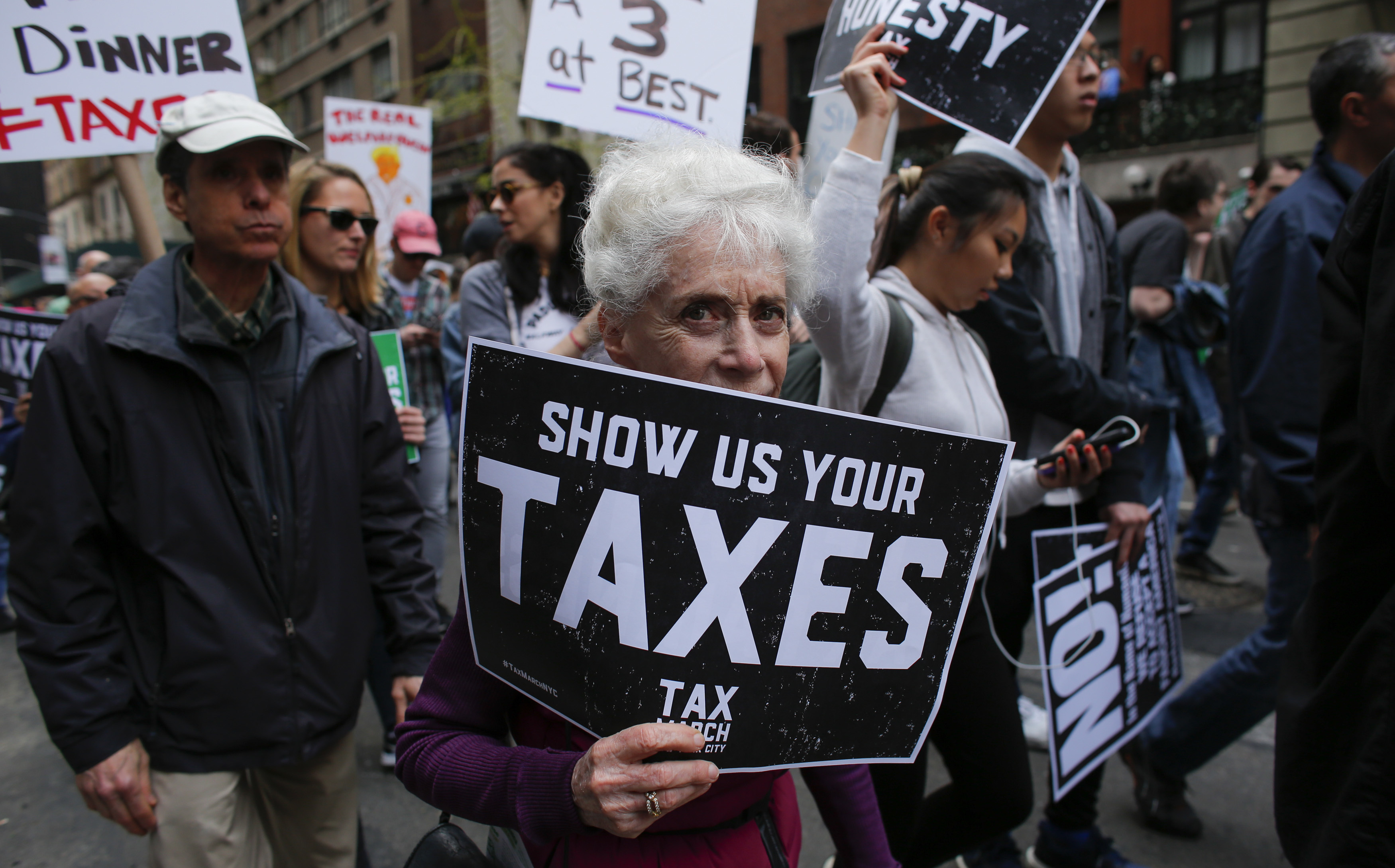 Protesters take part in the Tax March in New York on April 15 calling on President Trump to release his tax returns. (AFP/Getty Images)