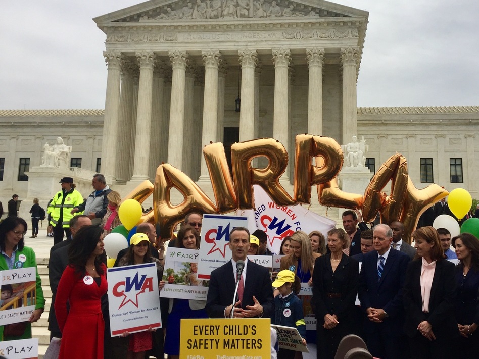 David Cortman of the Alliance Defending Freedom speaks after representing Trinity Lutheran Church before the Supreme Court on Wednesday. Concerned Women for America hosted a rally in support of the Missouri church on the court steps. (Lauren Russell/NPR)