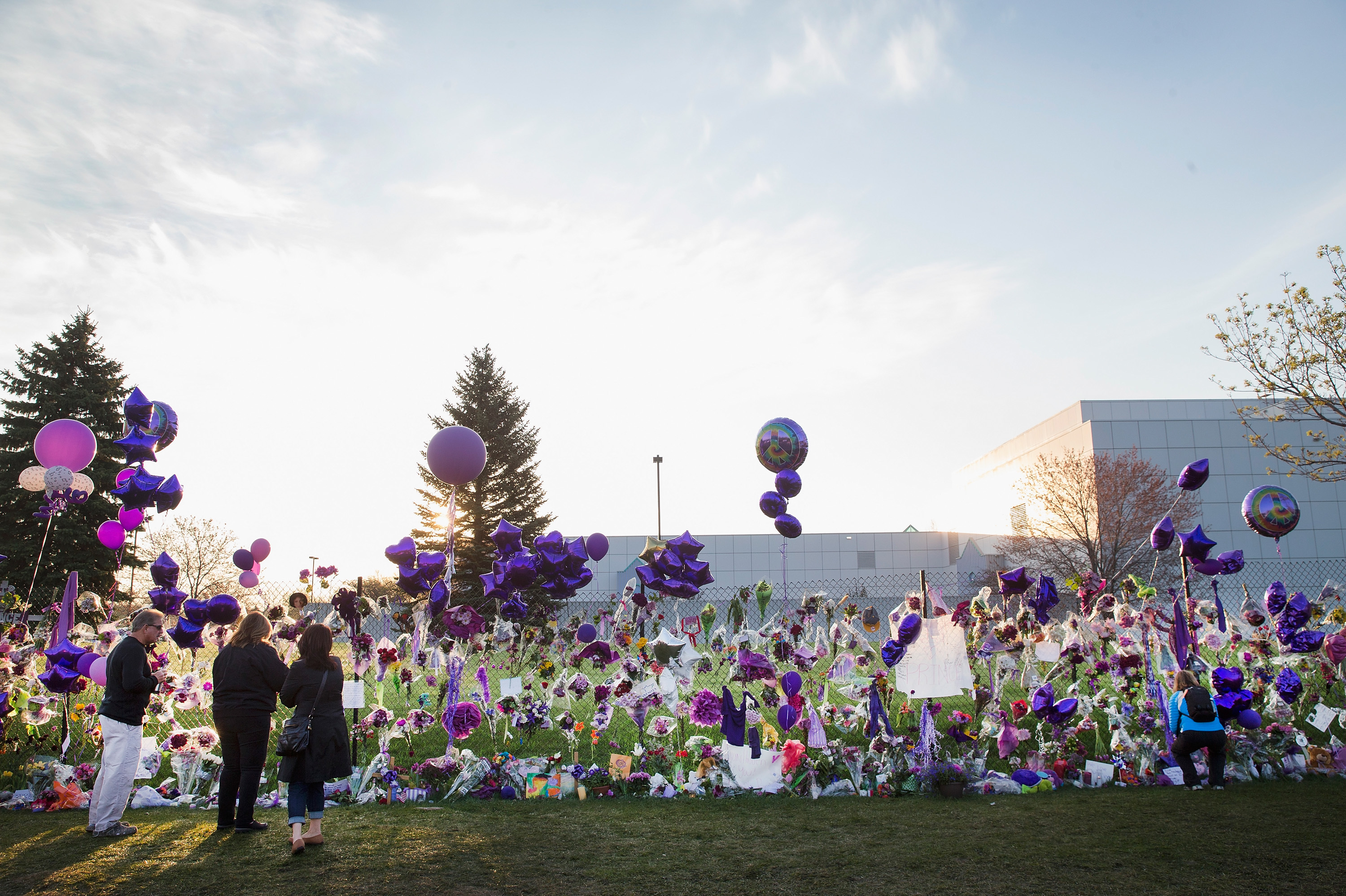 In The Wake Of Prince's Death 9 Fans visit a memorial created outside Paisley Park on April 23, 2016.