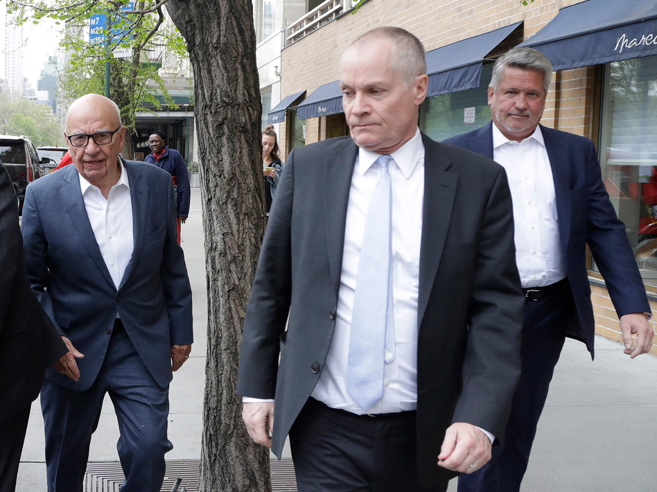 Rupert Murdoch (left) with Fox News co-presidents Jack Abernethy and Bill Shine today. Last week, Fox News fired Bill O'Reilly in a move to save a $14 billion dollar deal. (Mark Lennihan/AP)