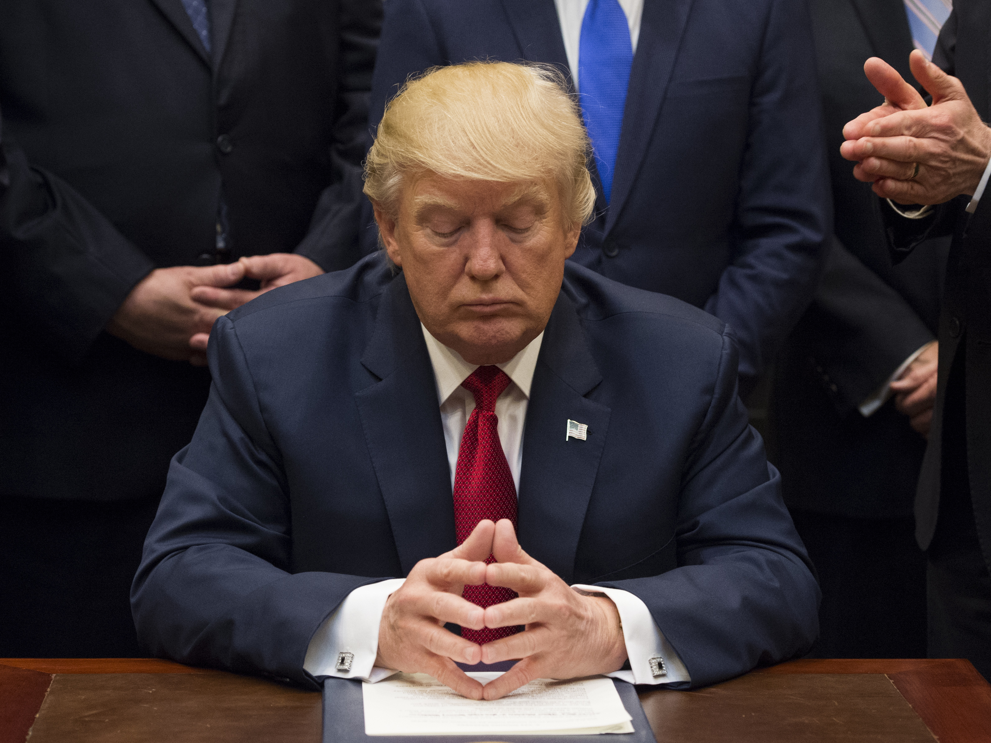 President Trump has left many scratching their heads on what kind of president he will be. His first 100 days as president offered conflicting messages. (Molly Riley/Pool/Bloomberg via Getty Images)