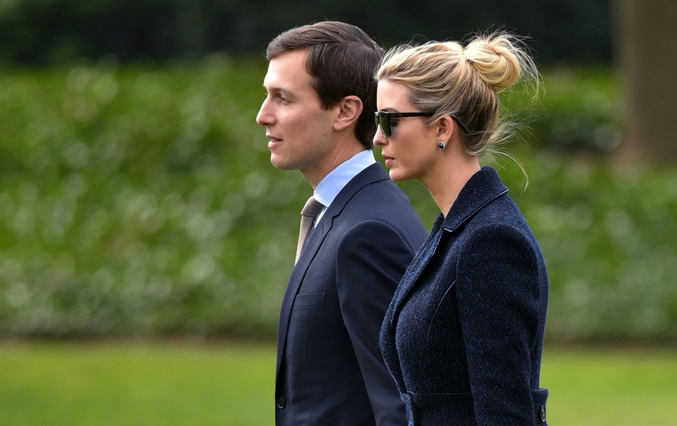 White House senior adviser Jared Kushner and his wife, Ivanka Trump, walk toward Marine One at the White House on March 3. A watchdog group says that Kushner should recuse himself from certain duties since he is President Trump's son-in-law and has potentially conflicting business ties. (Mandel Ngan/AFP/Getty Images)