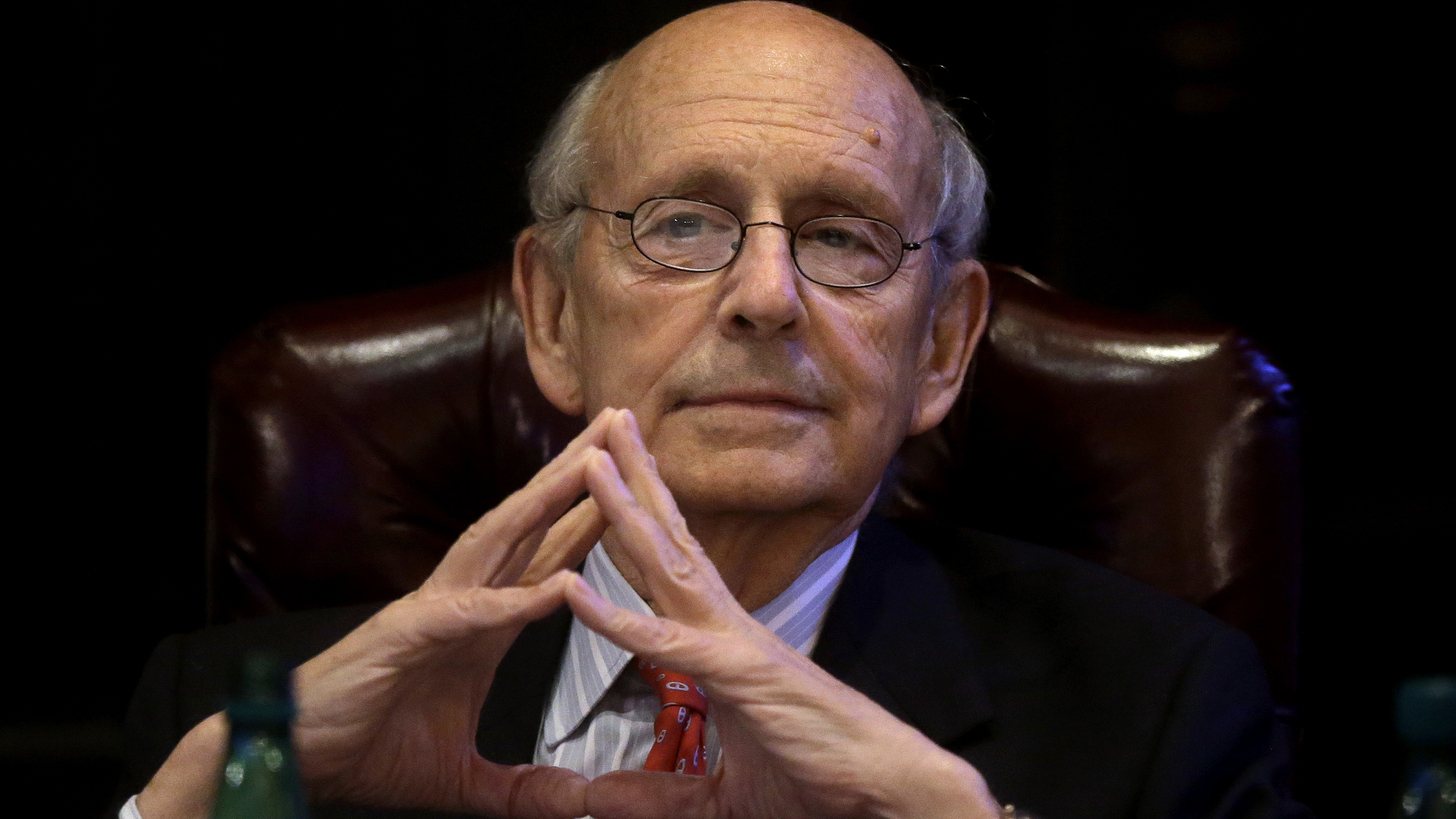 Supreme Court Justice Stephen Breyer listens during an event in Boston in February. On Tuesday, a high court argument was interrupted by the sound of a ring chime, and Breyer was the culprit.