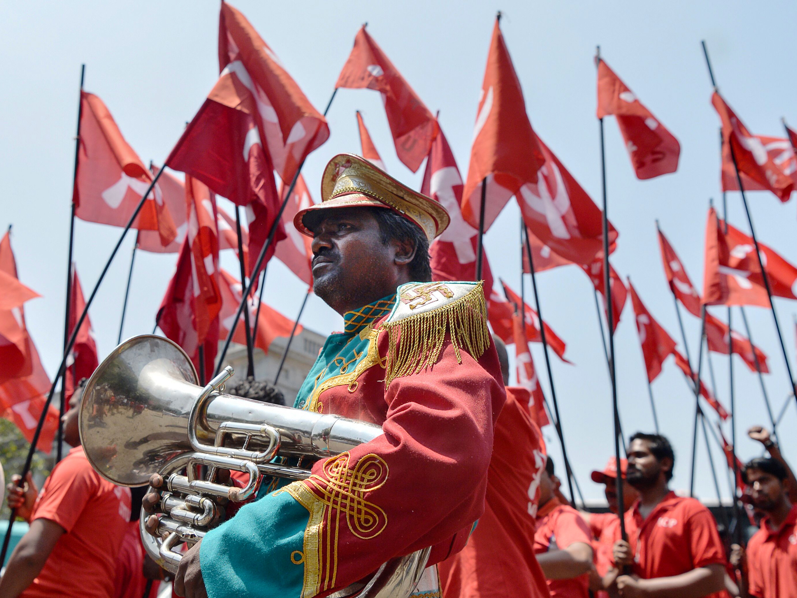May Day marchers around the world celebrate workers, immigrants